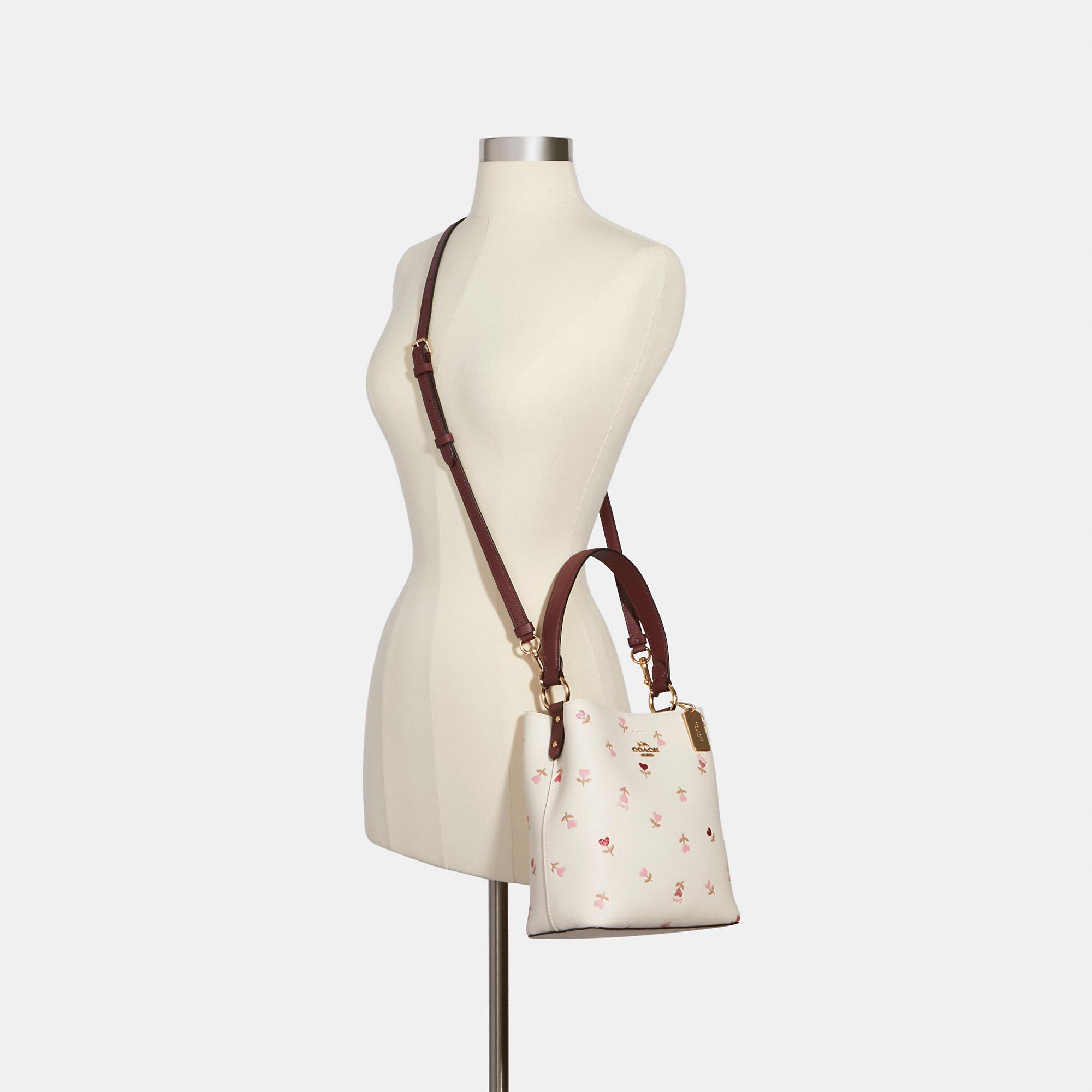 Mini Clara crossbody bag with hearts print from Coach - مون اوتليت Moon  Outlet - شنط ماركات اصلية