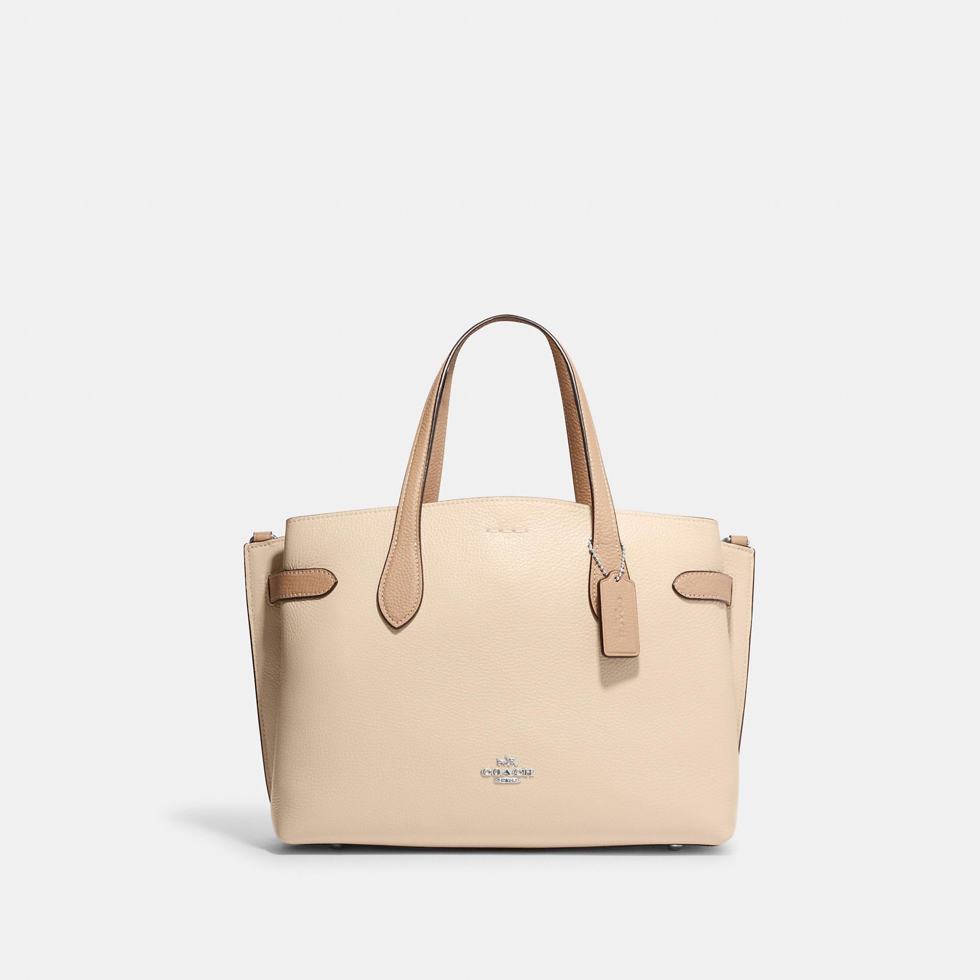 COACH®  Logan Carryall In Signature Canvas