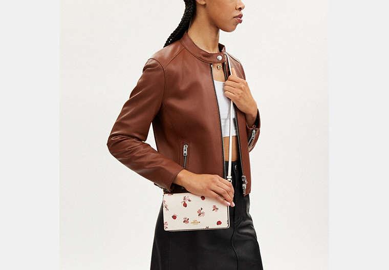 Anna foldover crossbody clutch with dandelion floral print sale