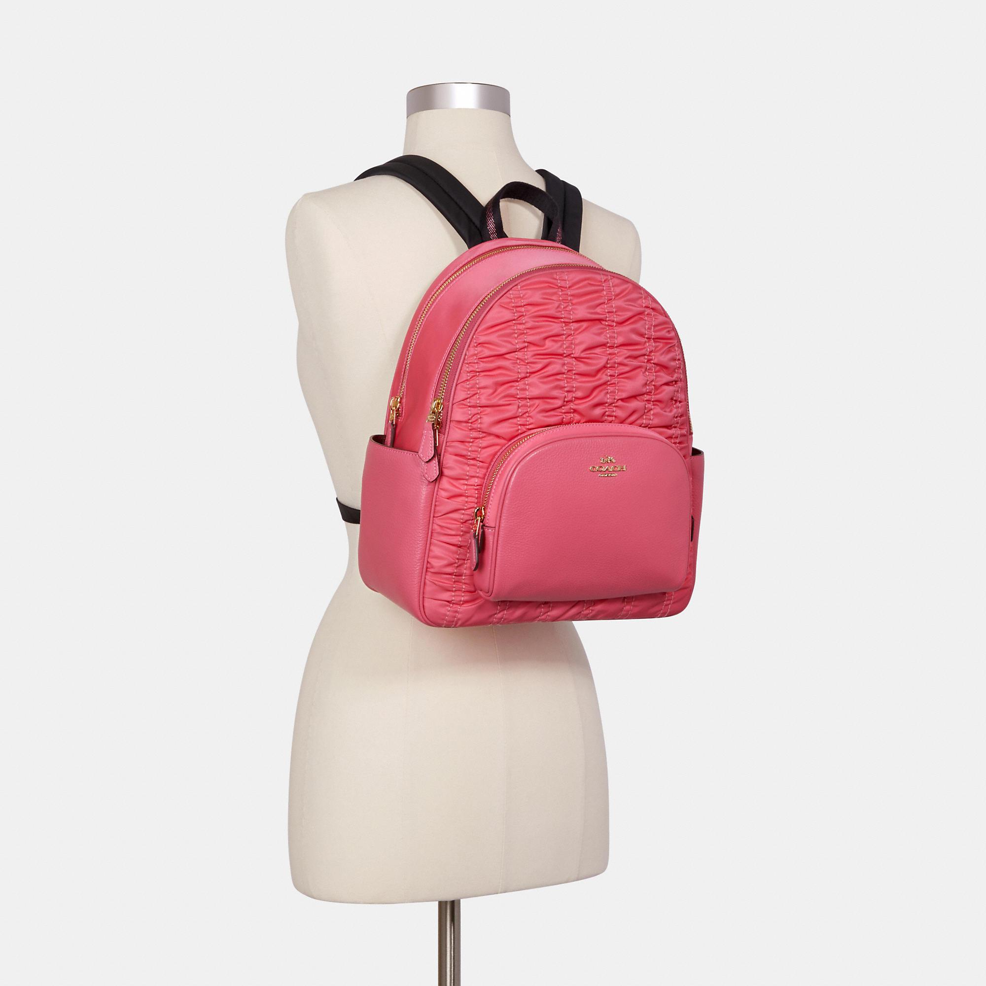 coach pink backpack