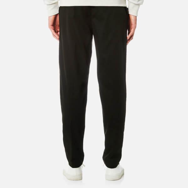dark green jogging bottoms