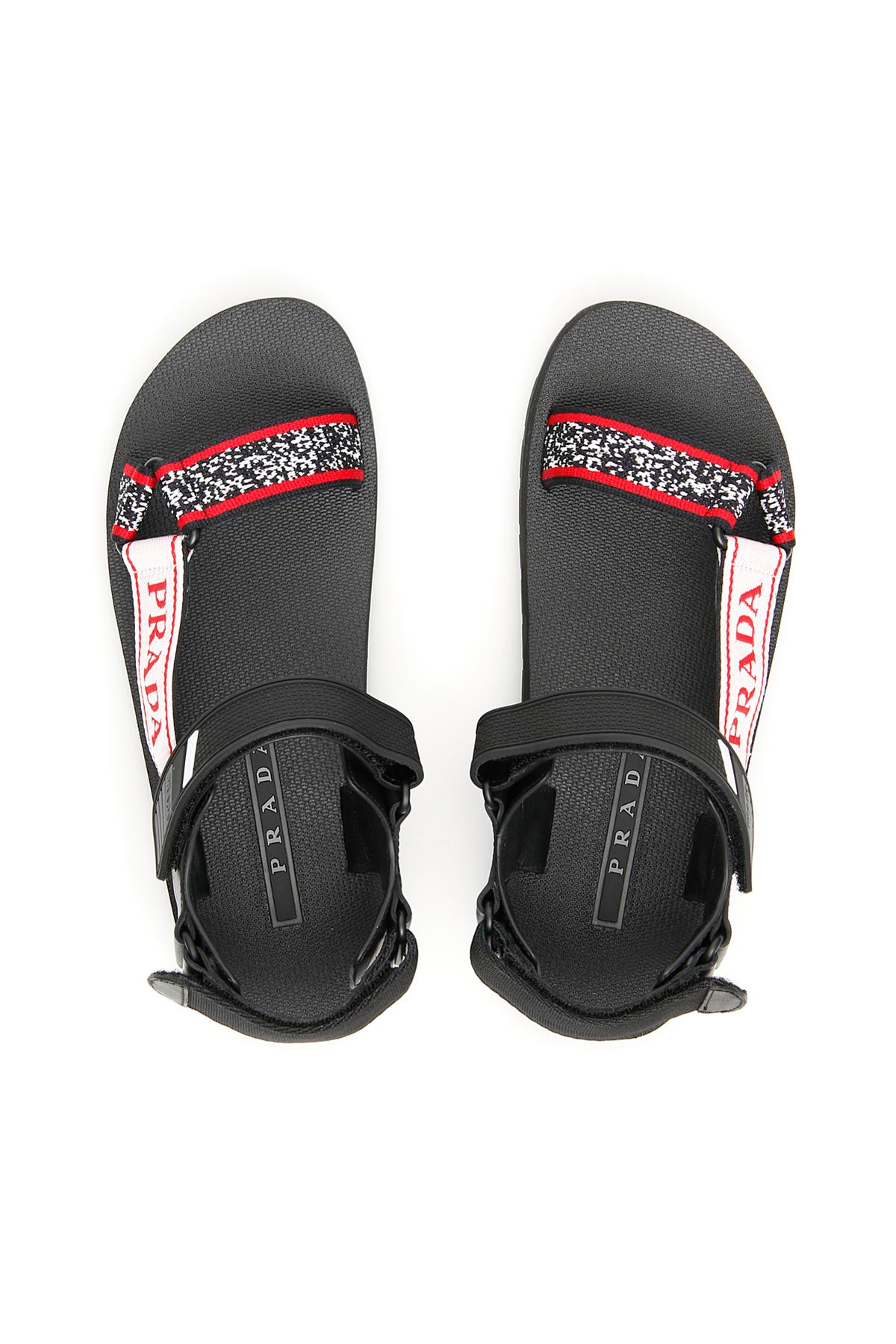 Prada Logo Nomad Sandals in Black - Lyst
