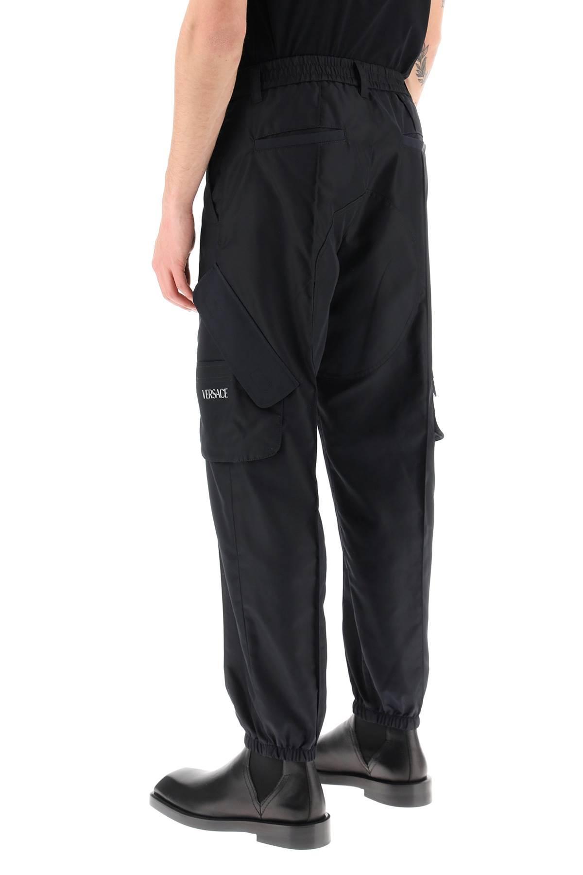 Versace Nylon Cargo Pants in Black for Men | Lyst