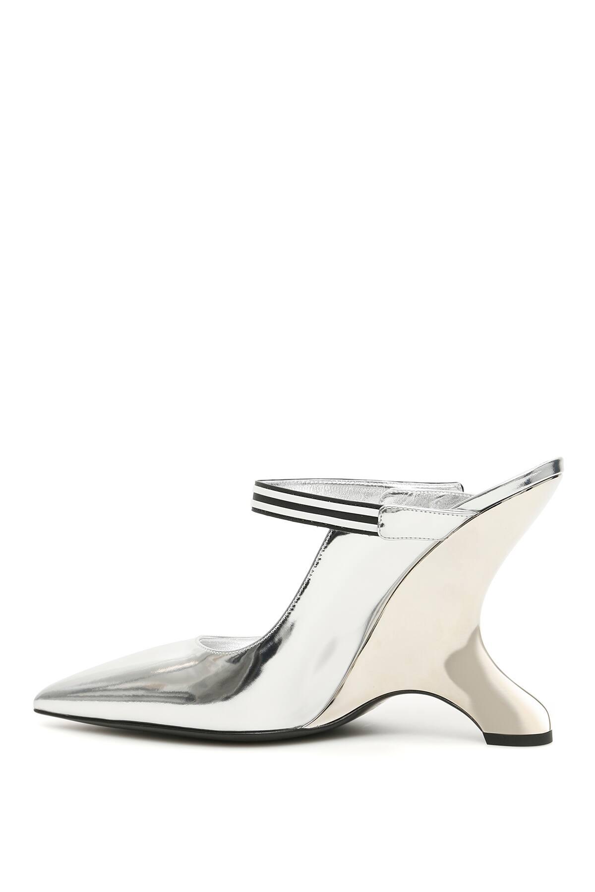 Prada Leather Metallic Mules - Lyst