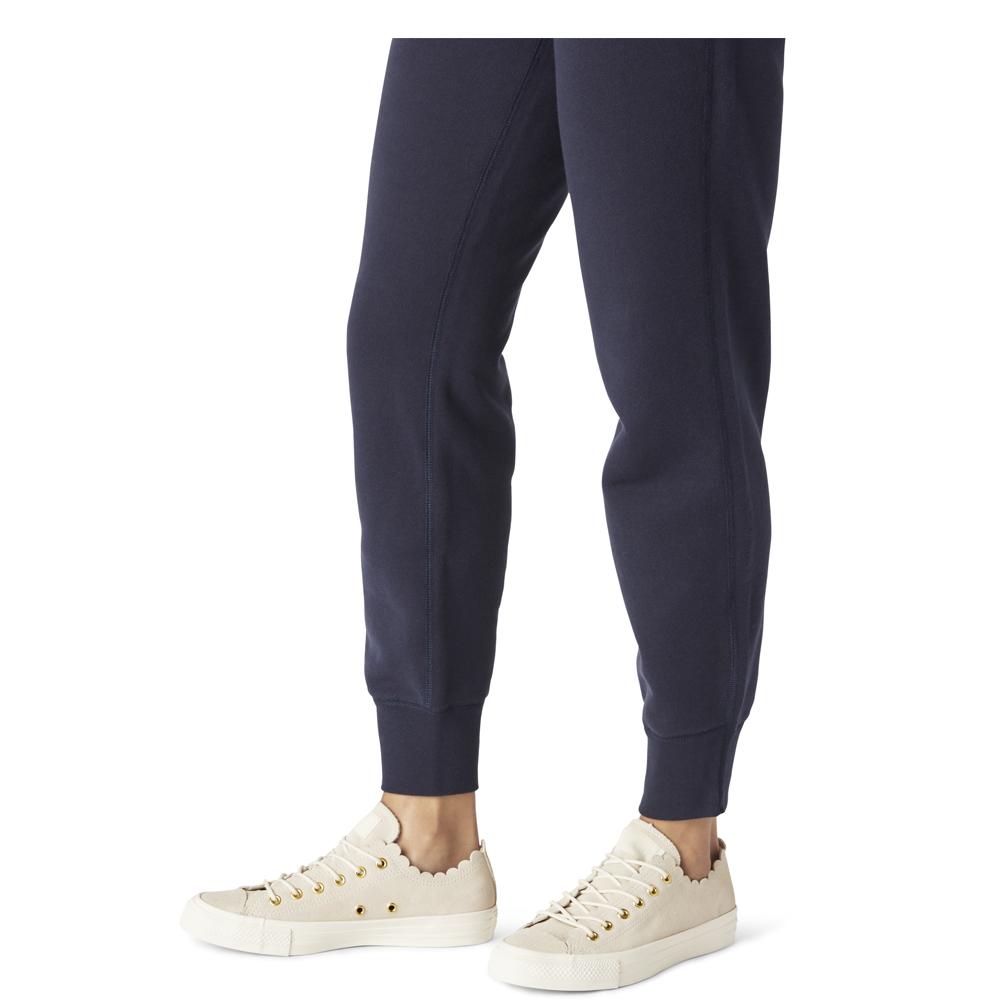 white frilly converse