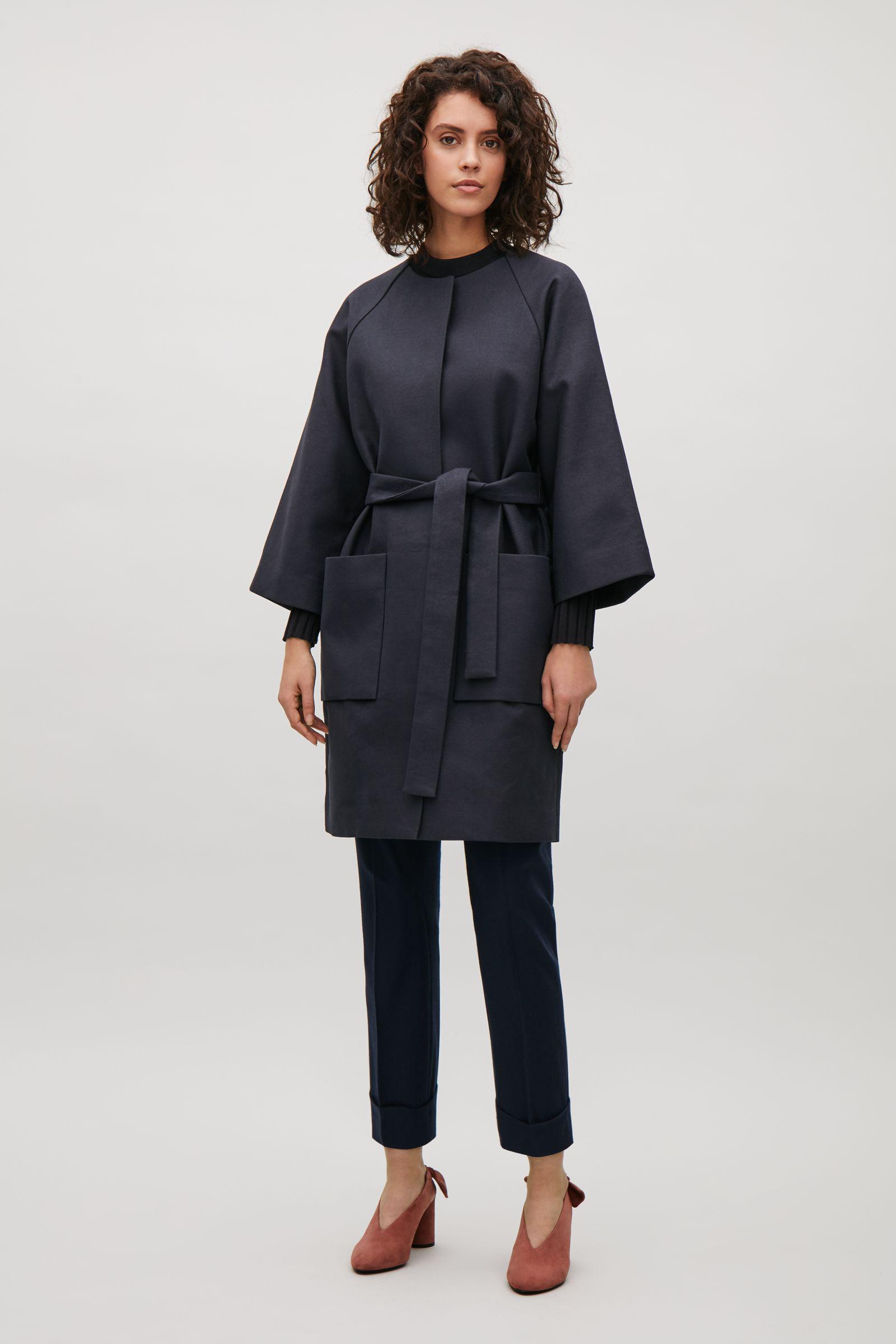 navy collarless coat