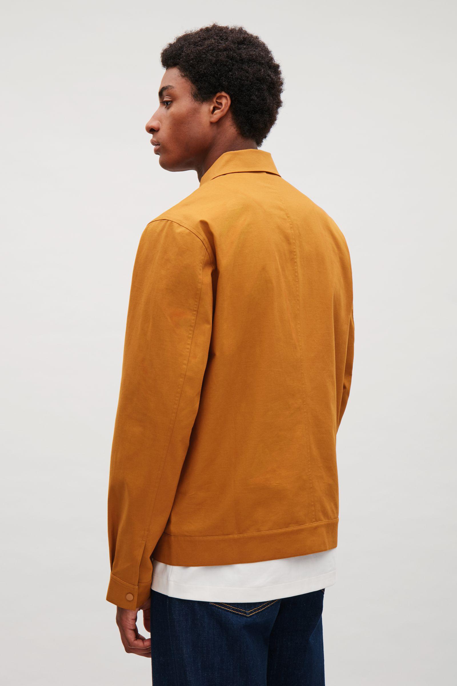 cos orange jacket