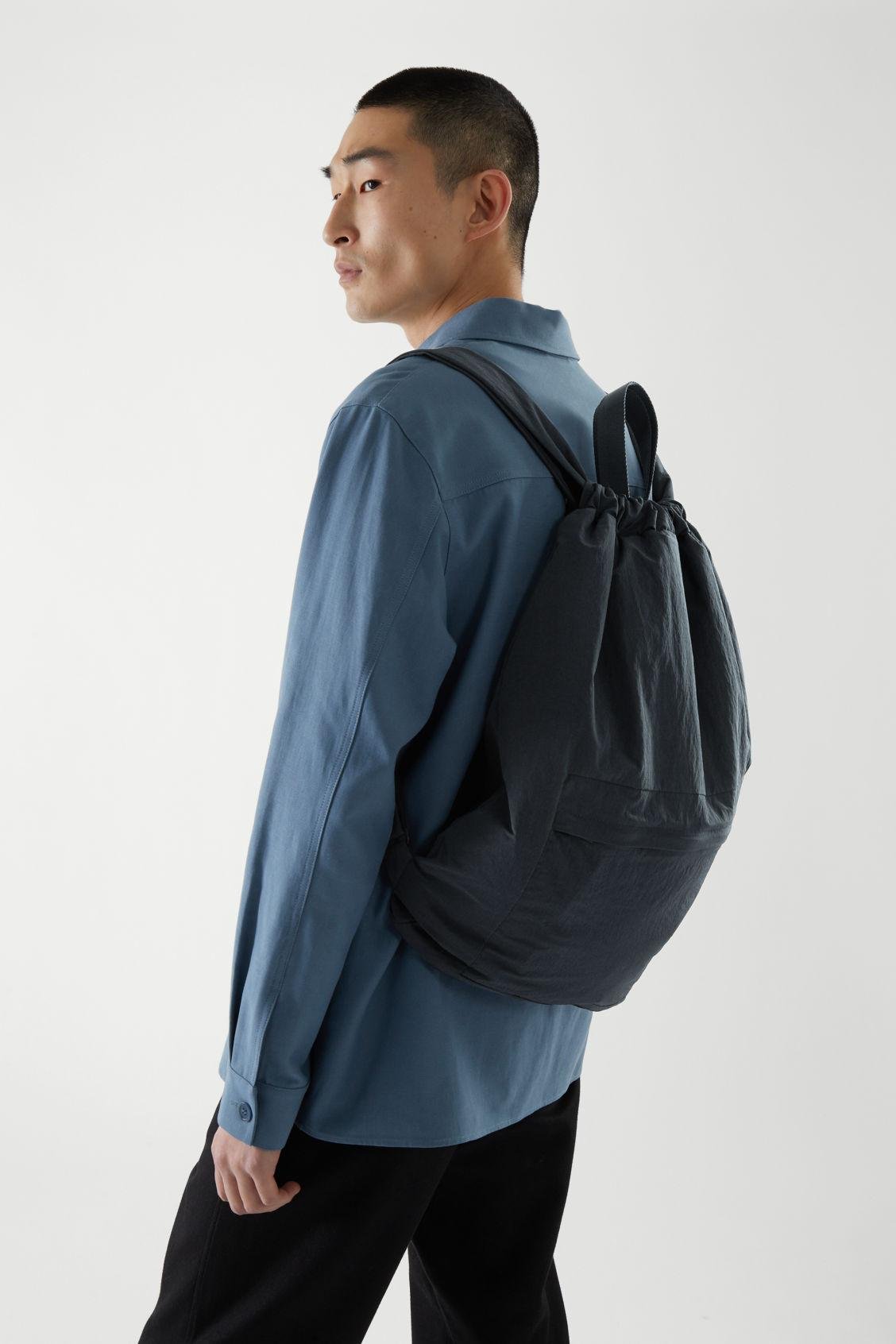 COS Drawstring Backpack in Blue for Men | Lyst