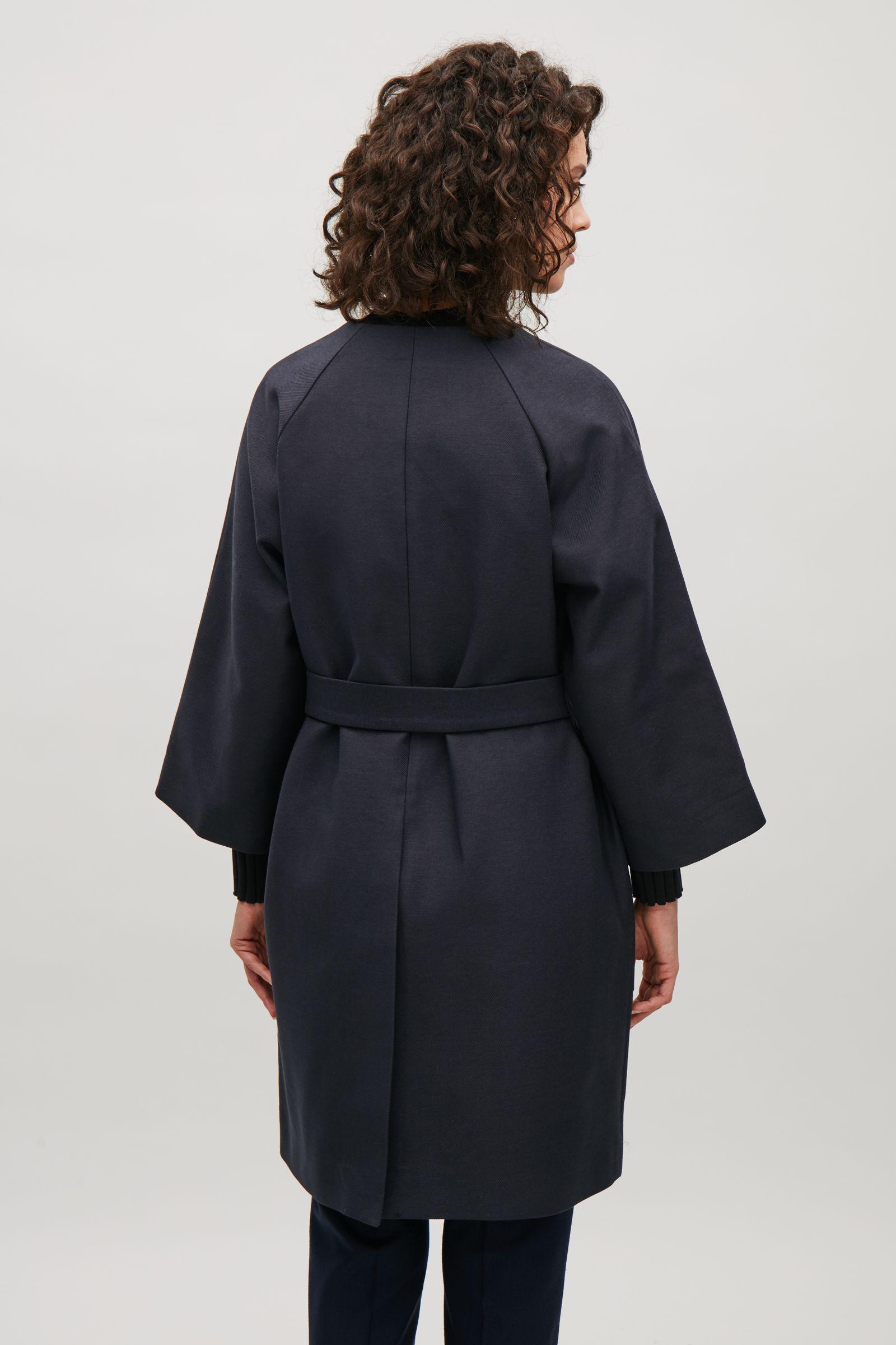 collarless navy coat