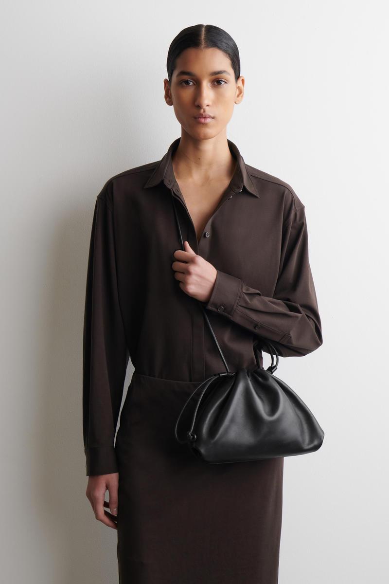 COS Mini Cavatelli Clutch Bag - Leather in Black | Lyst