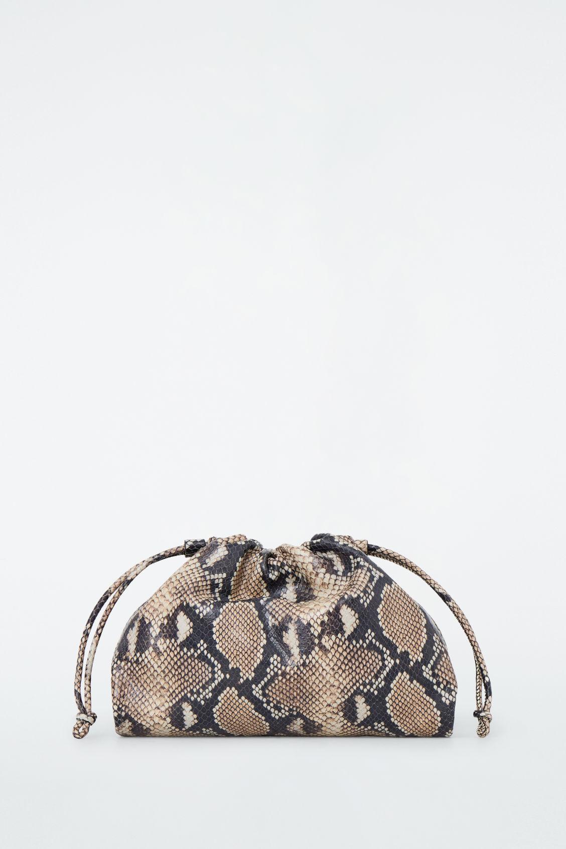 COS Mini Cavatelli Clutch Bag - Leather in Natural | Lyst