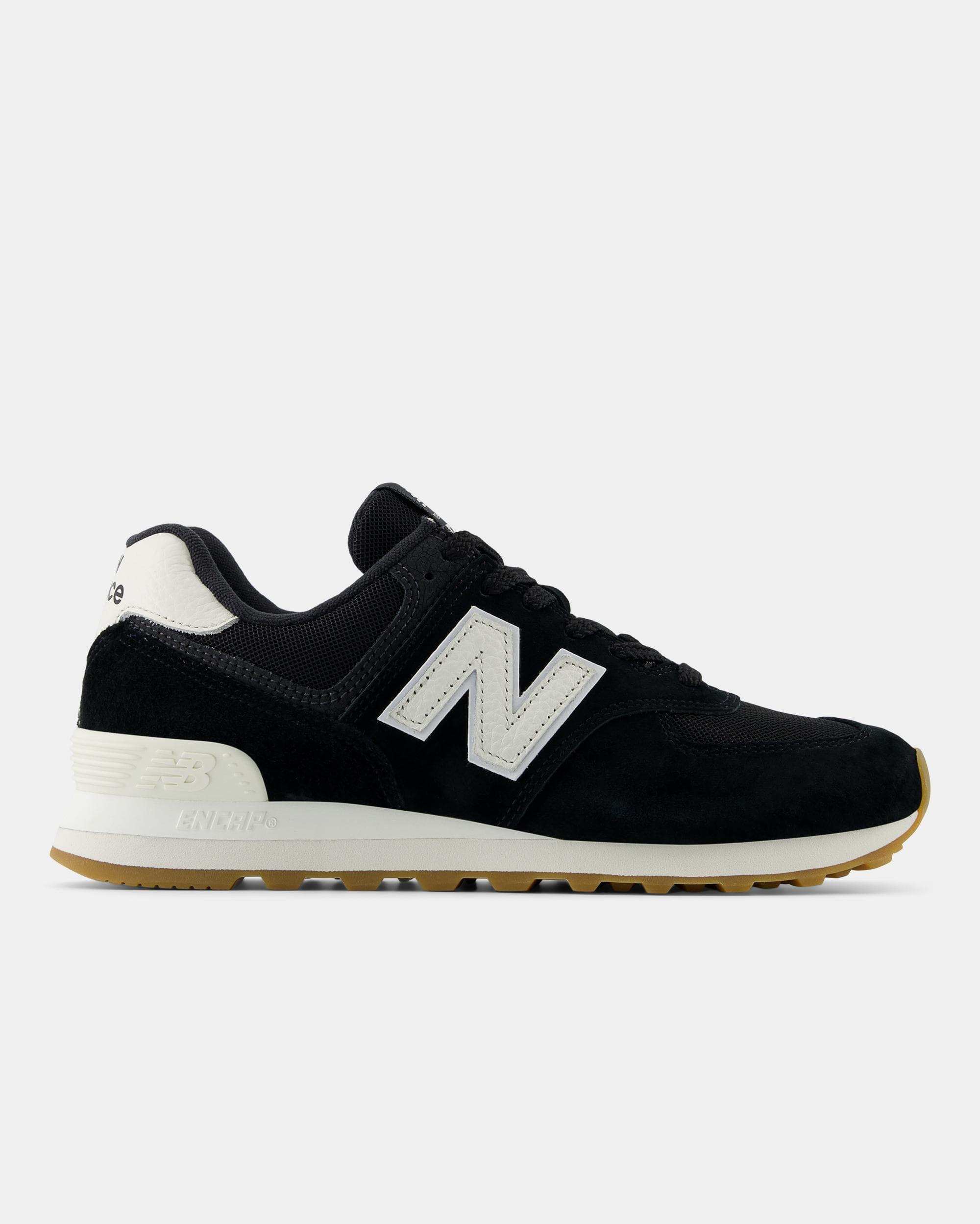 New Balance 574 Trainers in Black Lyst UK