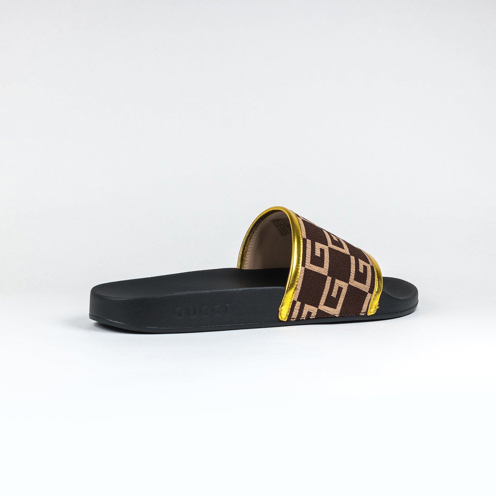 black and gold gucci slides