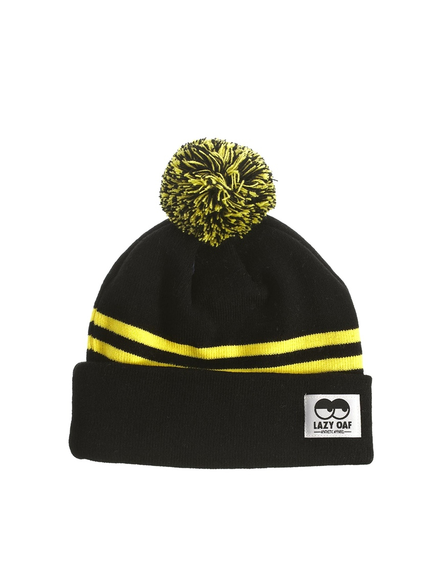 black and yellow bobble hat