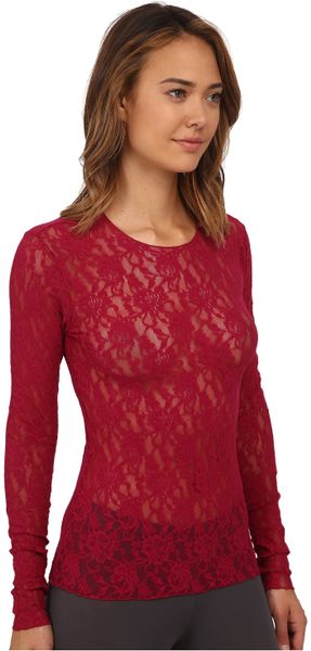 Long sleeve red lace top Crafted from soft and comfortable fabric, this top features a long sleeve with personalized stripe elbow patch, lace-up with slit design at the back. Style yours with high-rise jeans and trainers for a fresh summer festival look, accessorizing perfectly with oversized sunglasses.