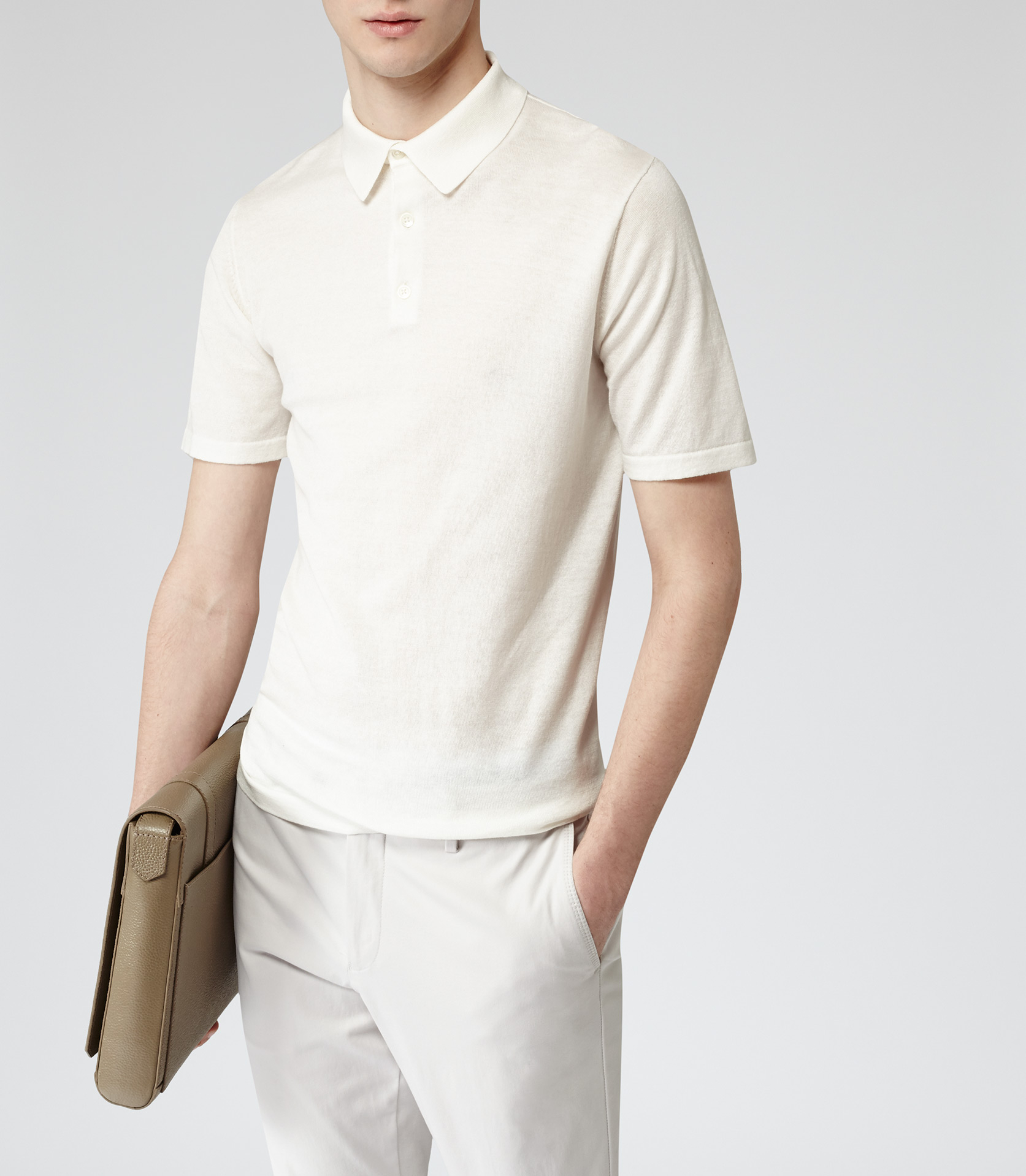 white knitted polo