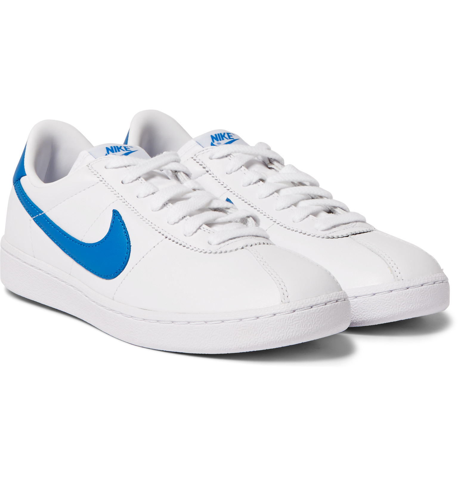 nike white sneakers with brown sole