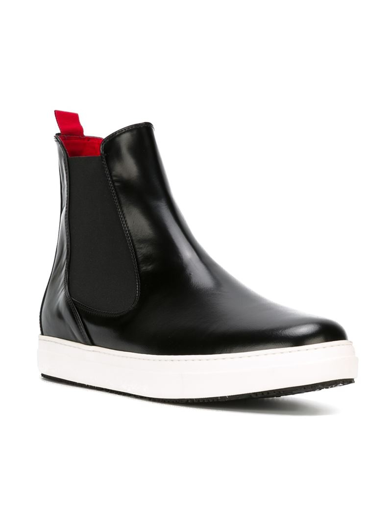 black boots with white soles