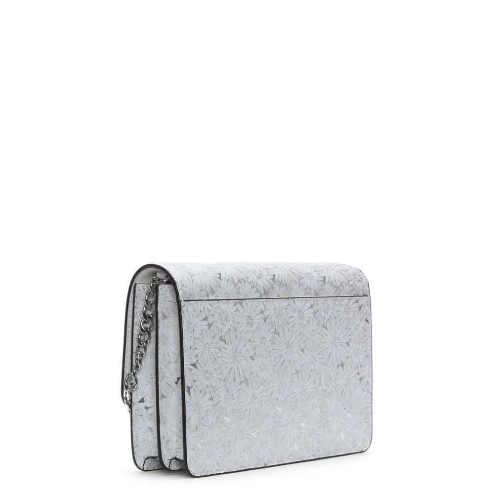 white and silver michael kors purse