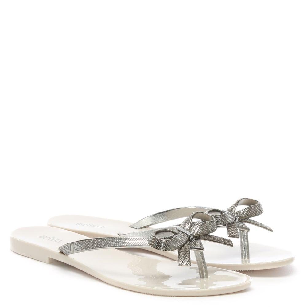 silver bow flip flops