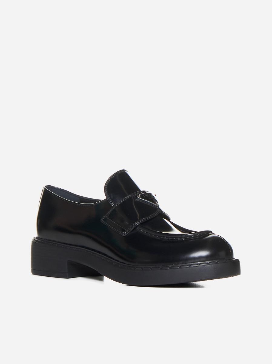 Prada Logo plaque Leather Loafers in Black Lyst UK
