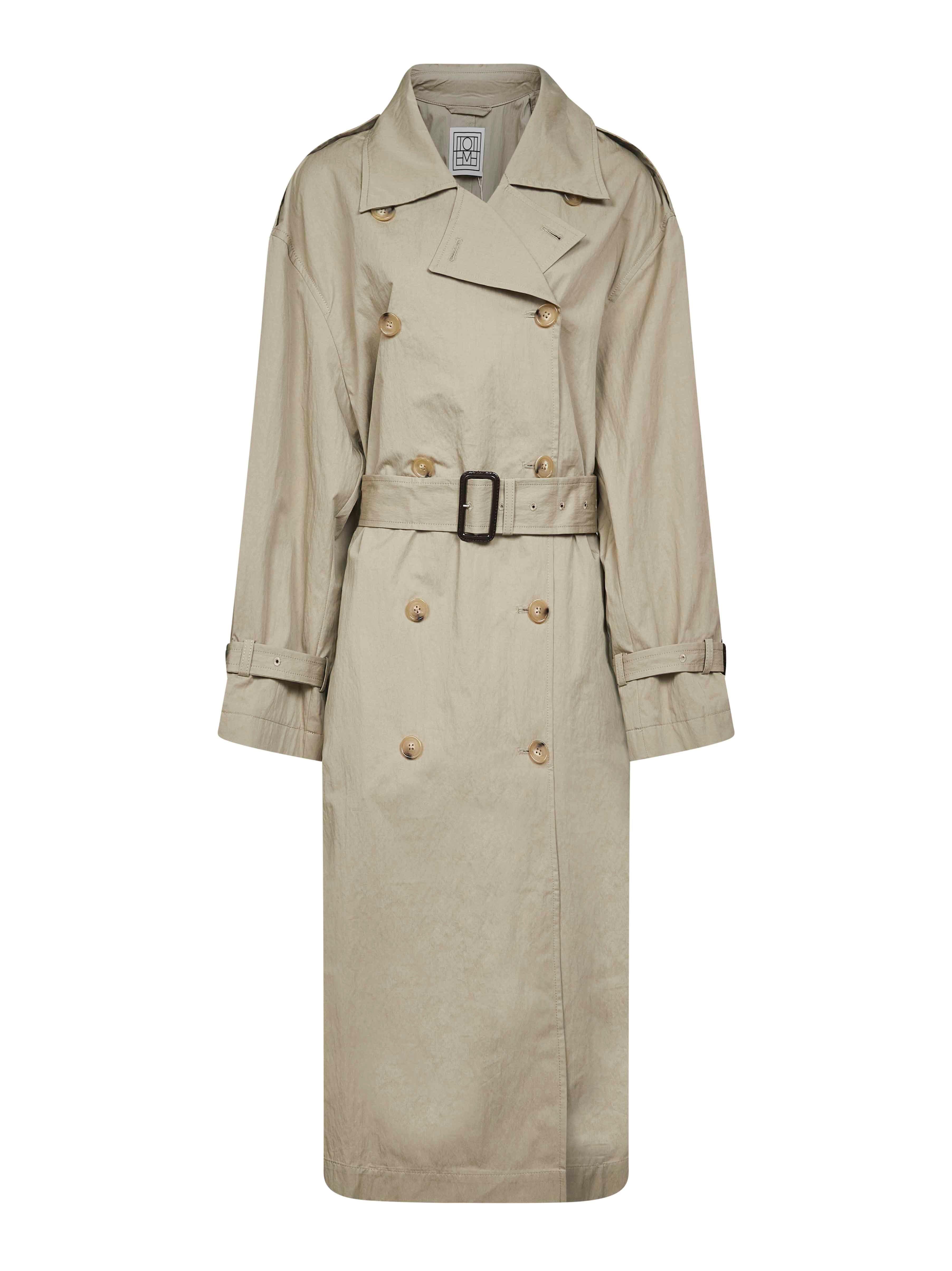 【TOTEME】Long trench coat Signature cotton-blend trench coat in beige - Toteme | Mytheresa