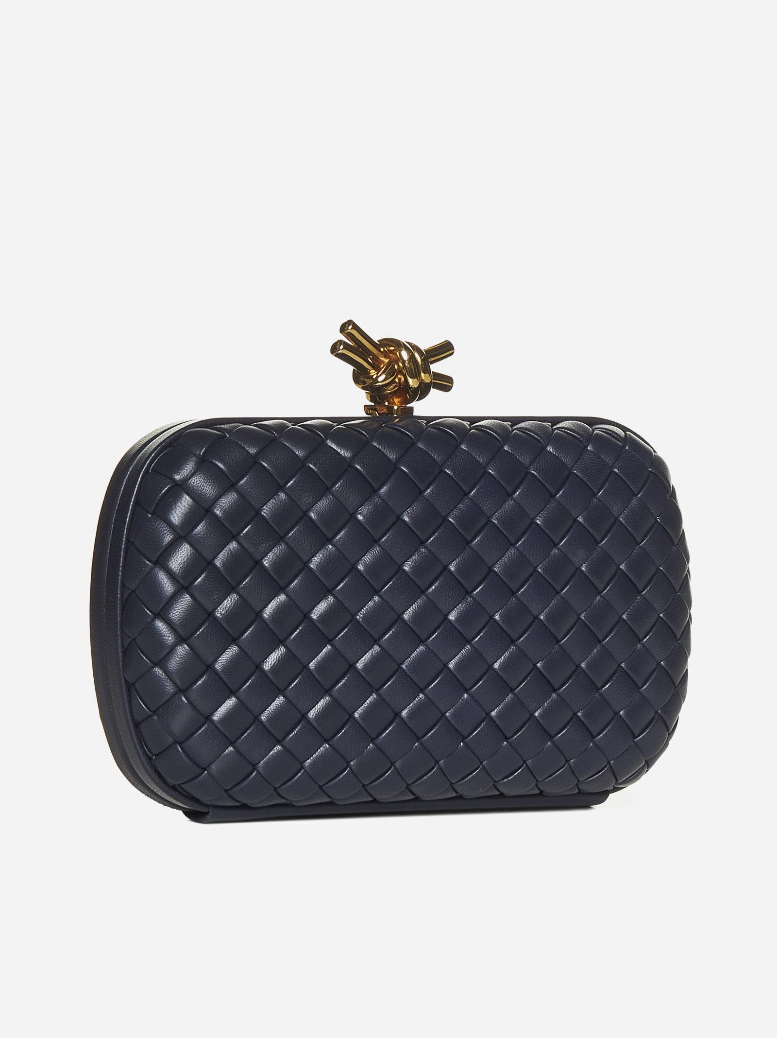 Knot padded intrecciato leather clutch