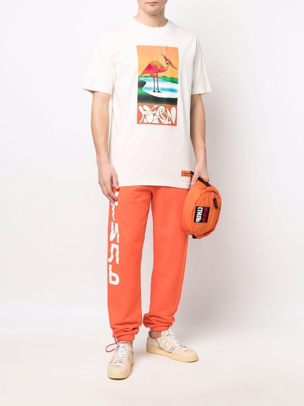 Heron Preston Logo Trousers in Orange 