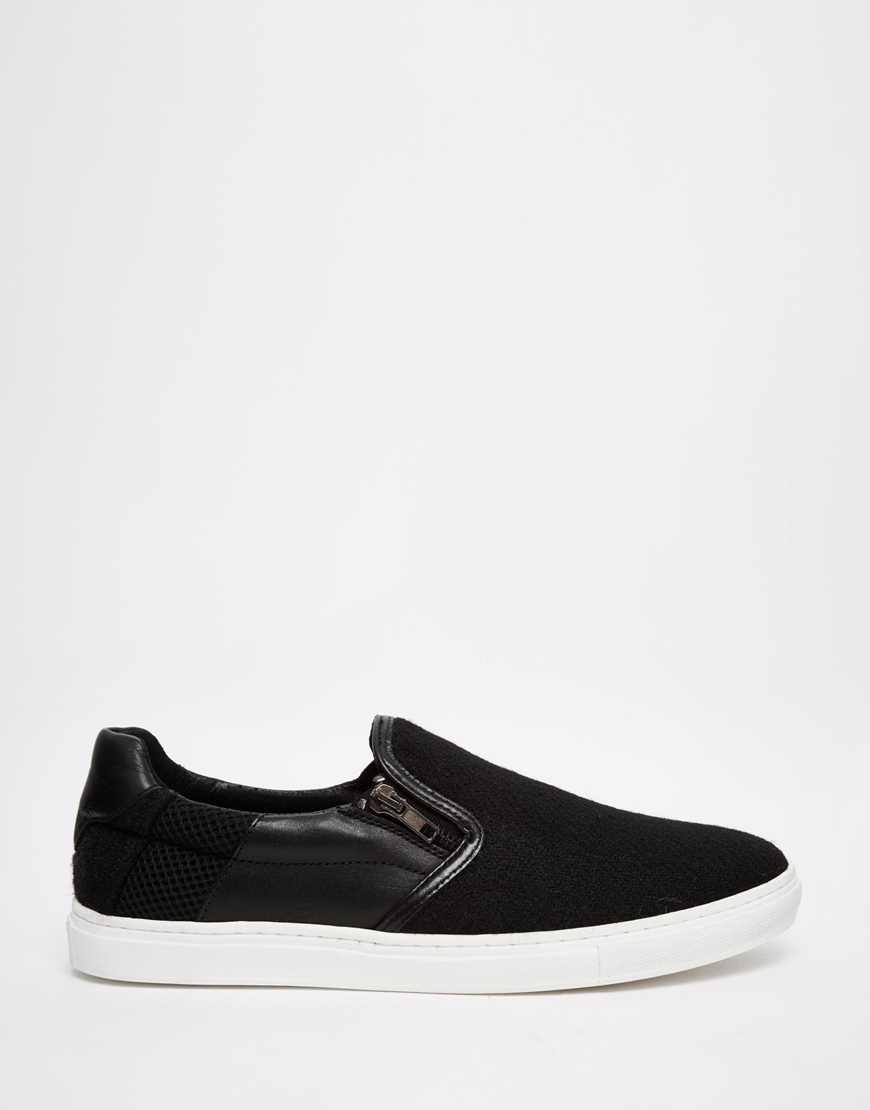 black leather plimsolls