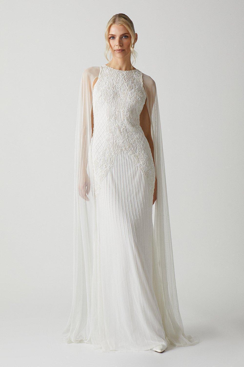 Long sleeve wedding dress with cape cheap