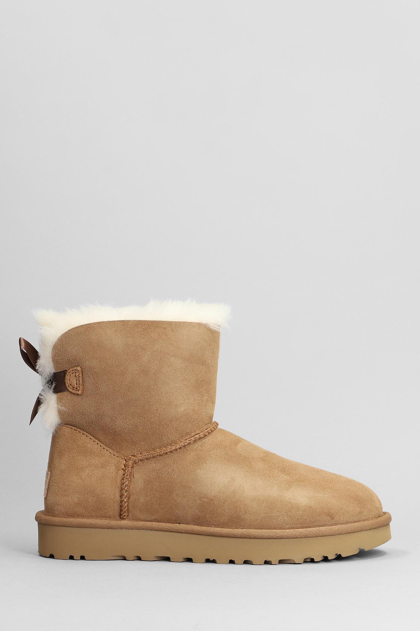 UGG Mini Bailey Bow Ii Low Heels Ankle Boots In Leather Color Suede in  Brown | Lyst