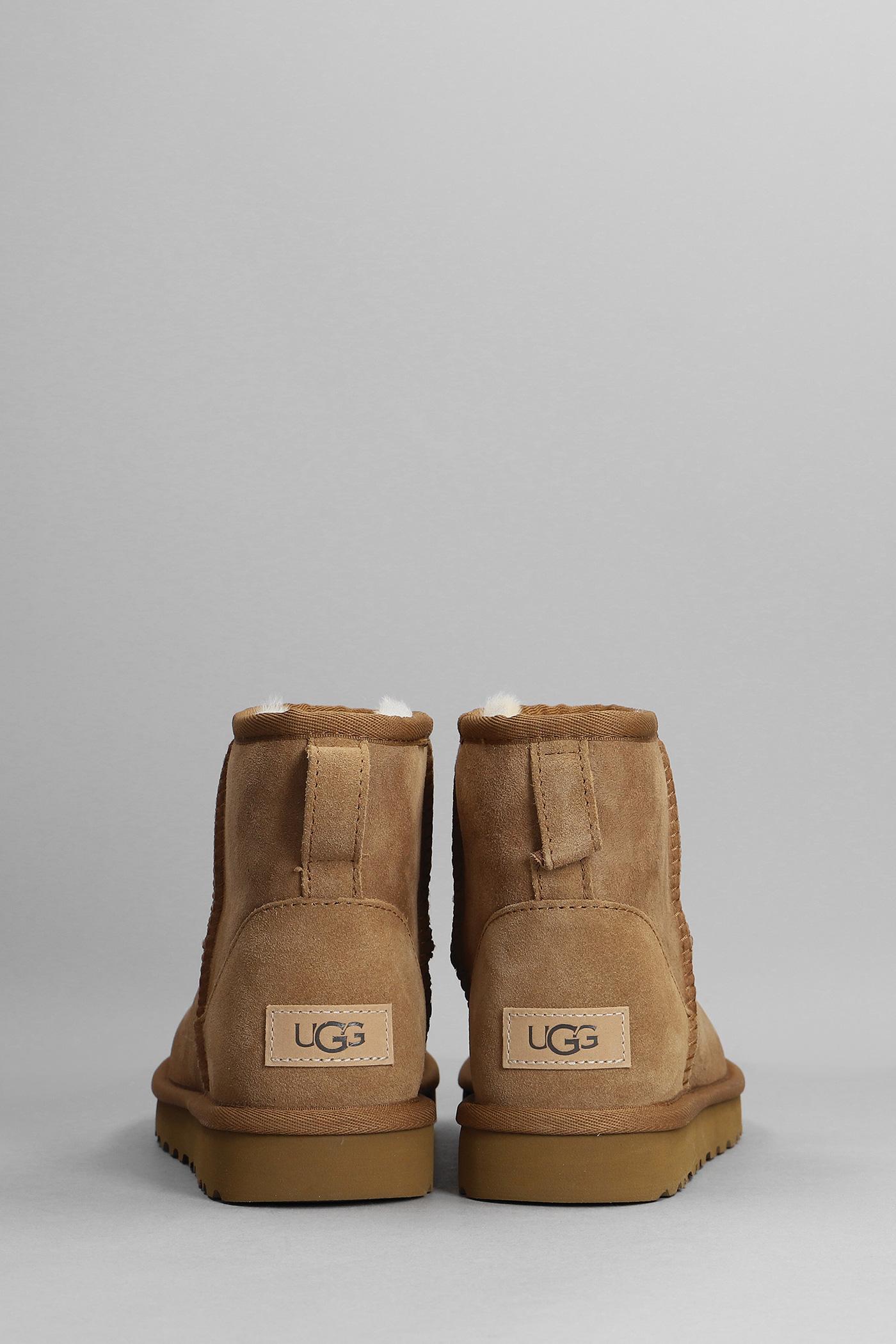 UGG Mini Classic Ii Low Heels Ankle Boots In Leather Color Suede in Brown |  Lyst