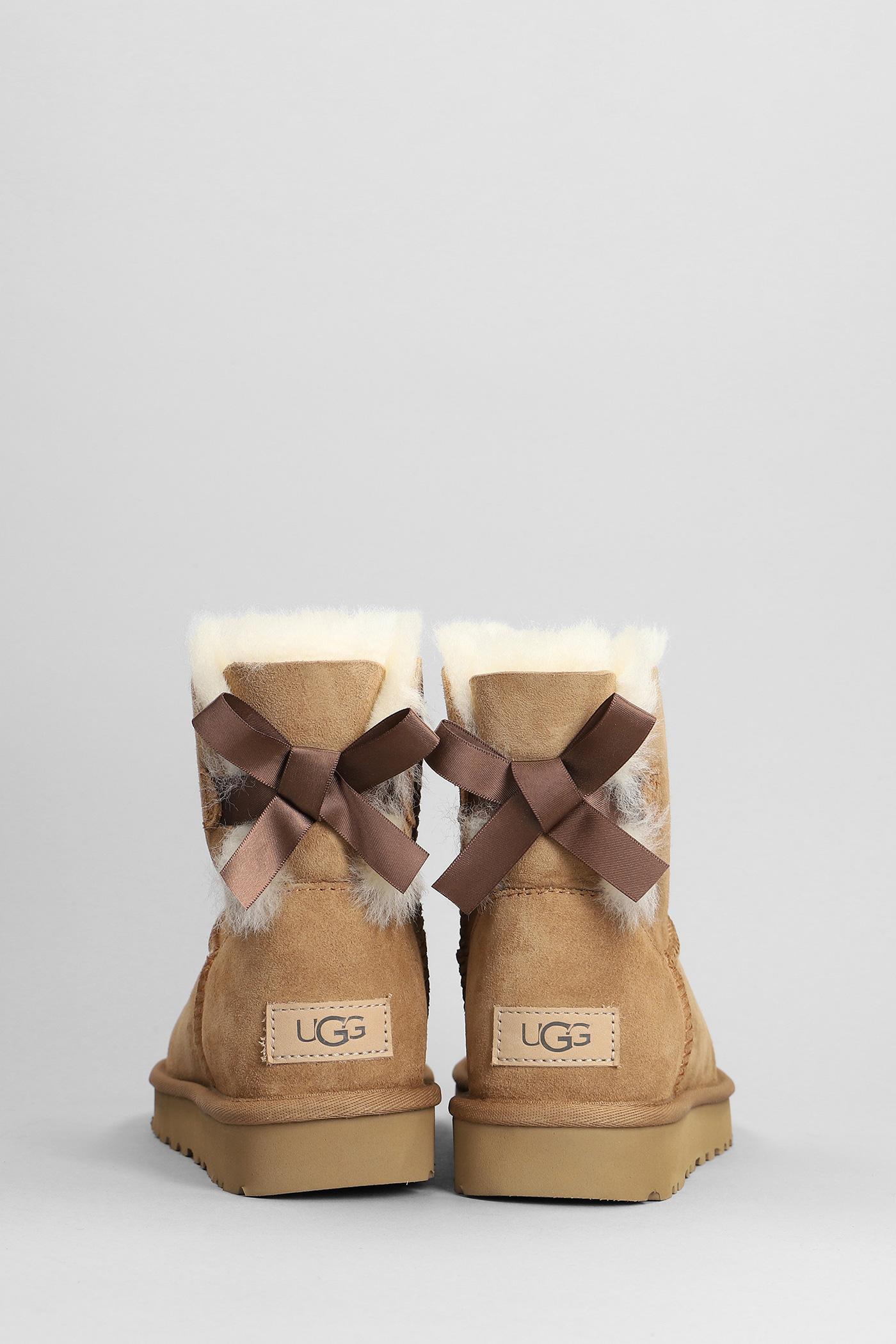 UGG Mini Bailey Bow Ii Low Heels Ankle Boots In Leather Color Suede in  Brown | Lyst