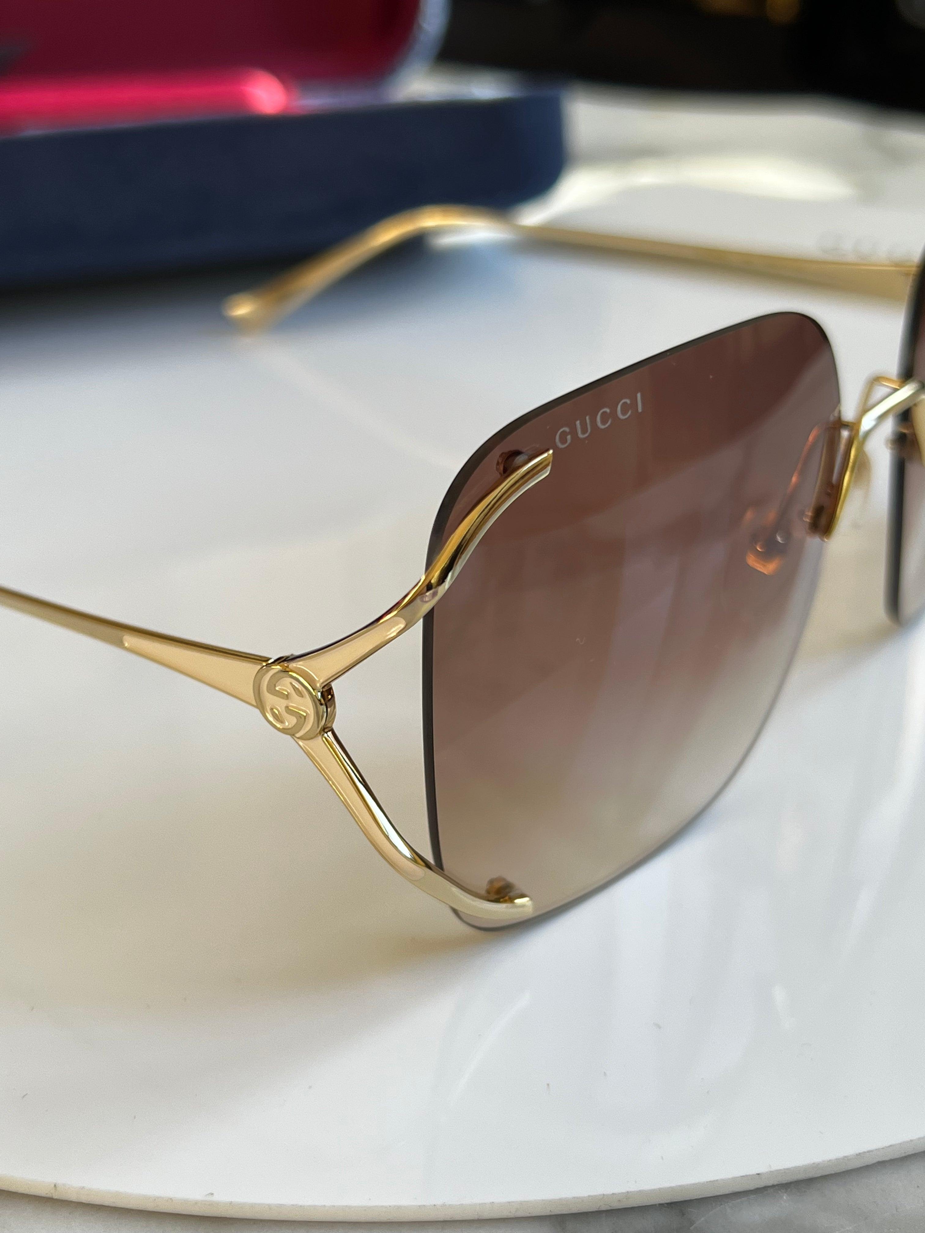 Gucci GG0646S Rimless Oversized Sunglasses in Natural
