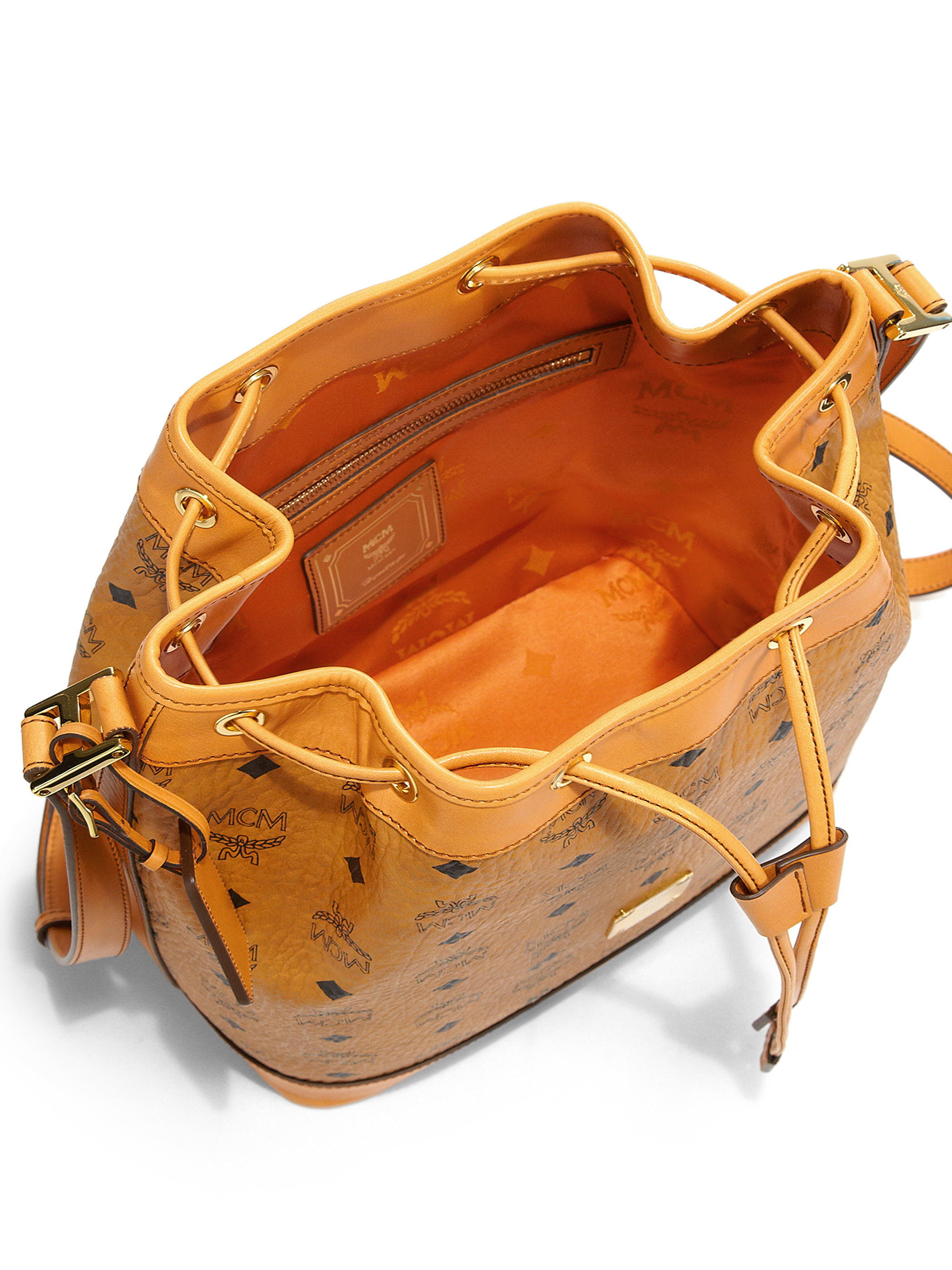 MCM Heritage Small Coated Canvas Bucket Bag in Cognac (Brown) - Lyst