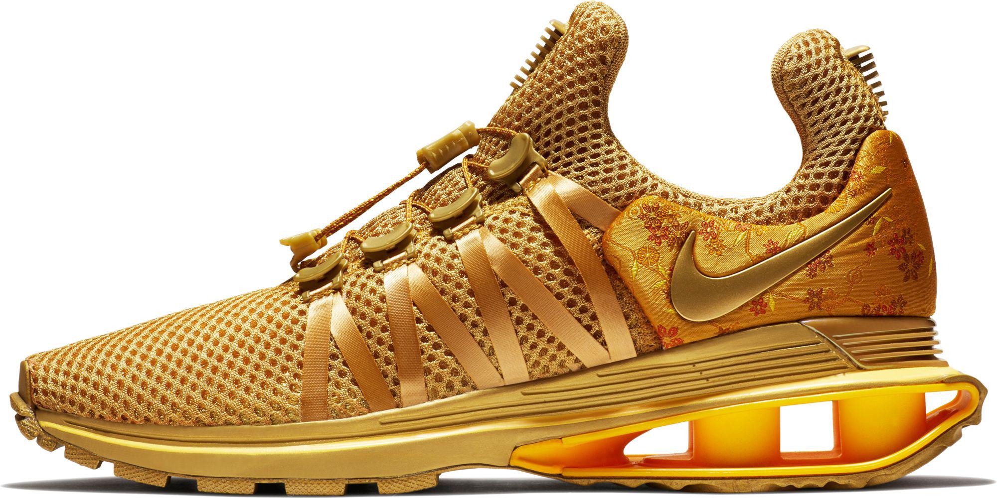 nike shox gravity gold