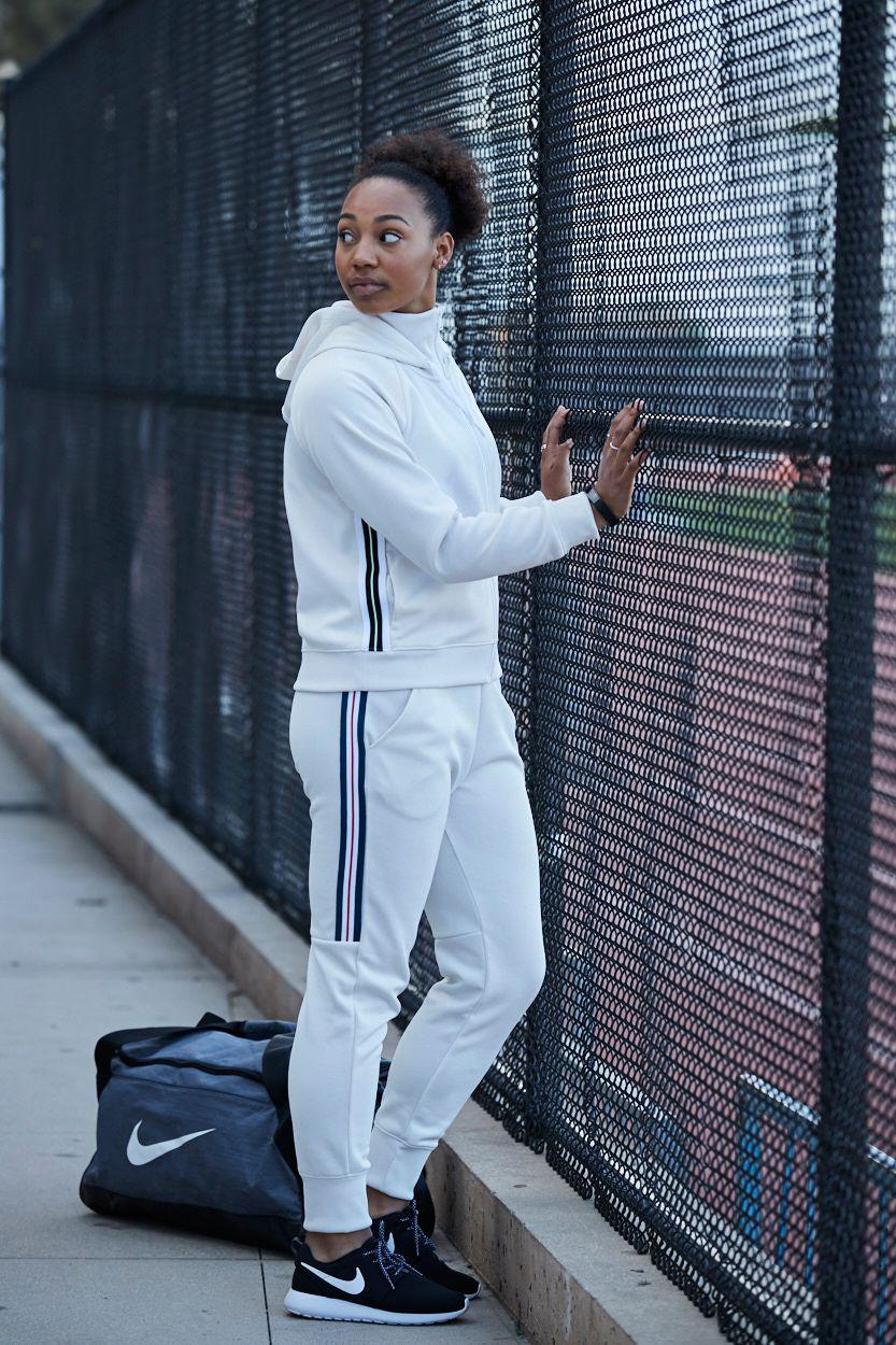 nike women's sportswear tracksuit joggers rust pink