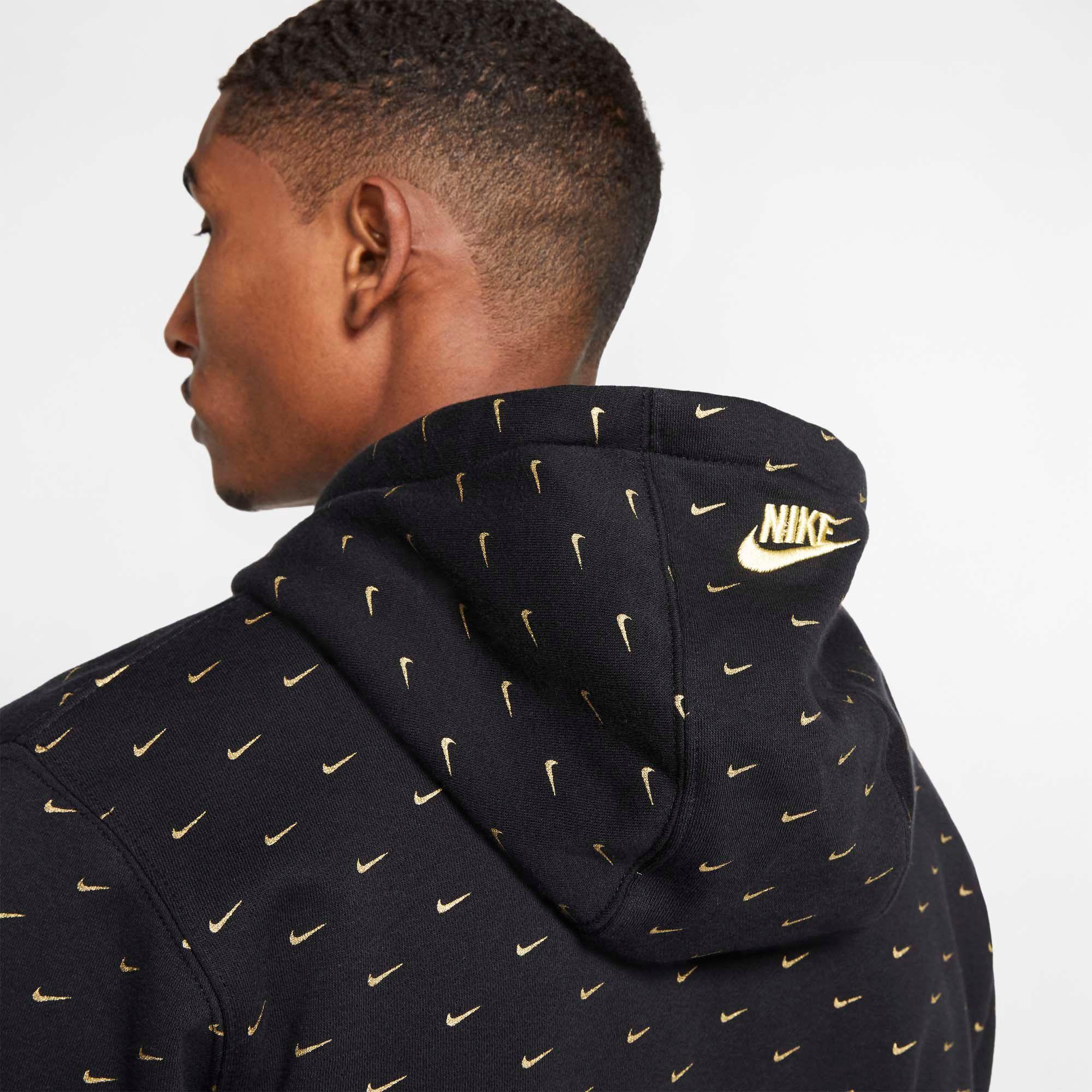 gold and black nike sweater