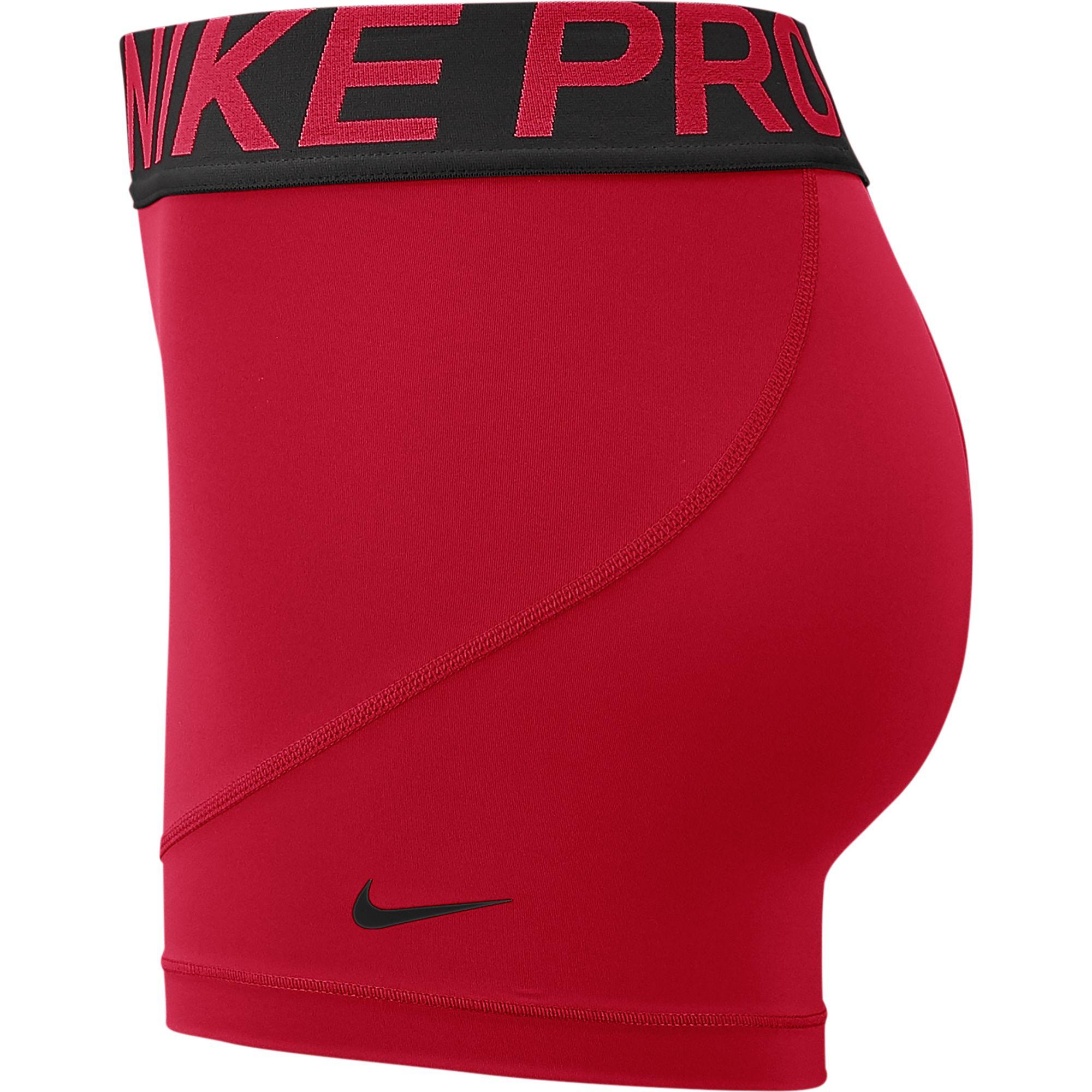 red nike shorts