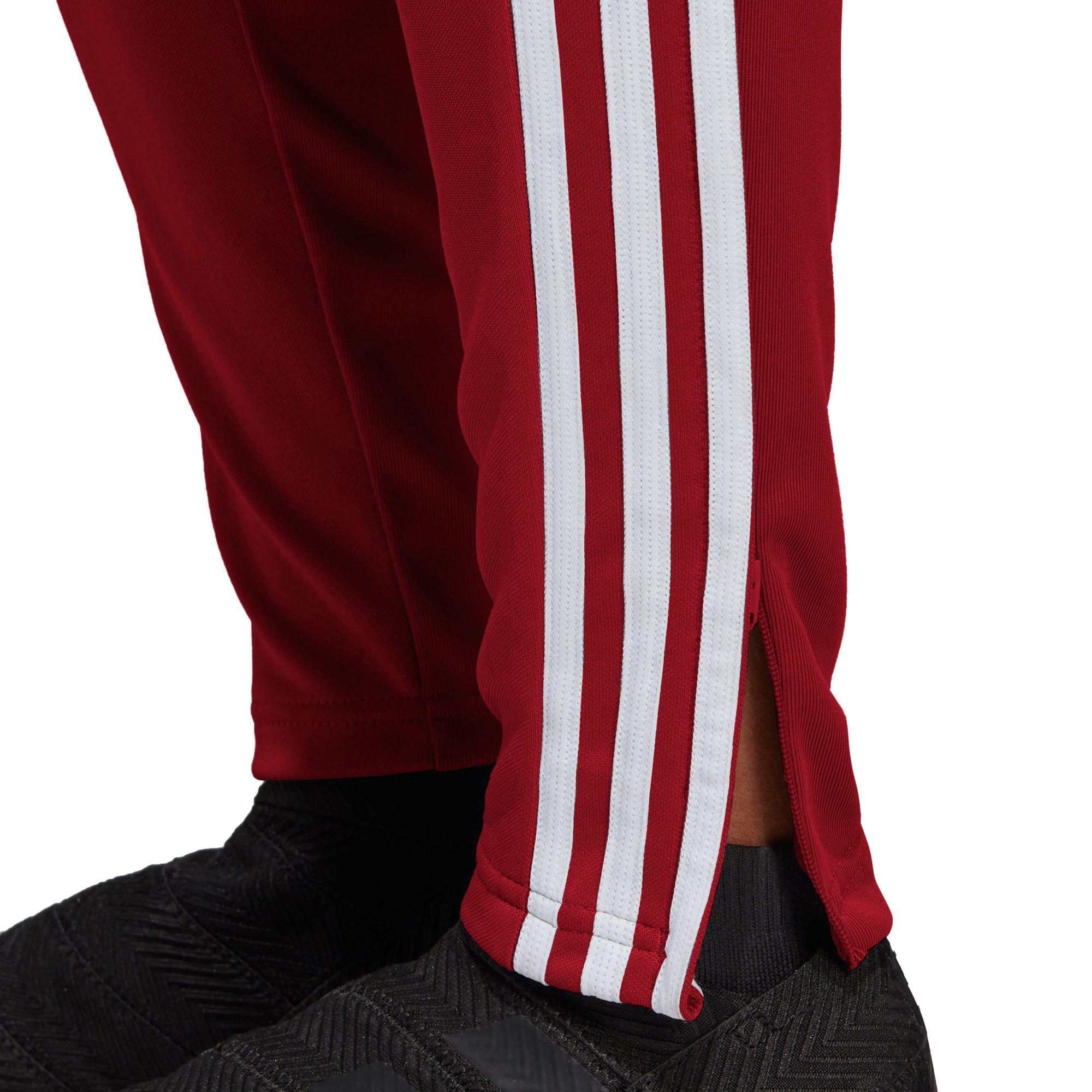 red tiro pants