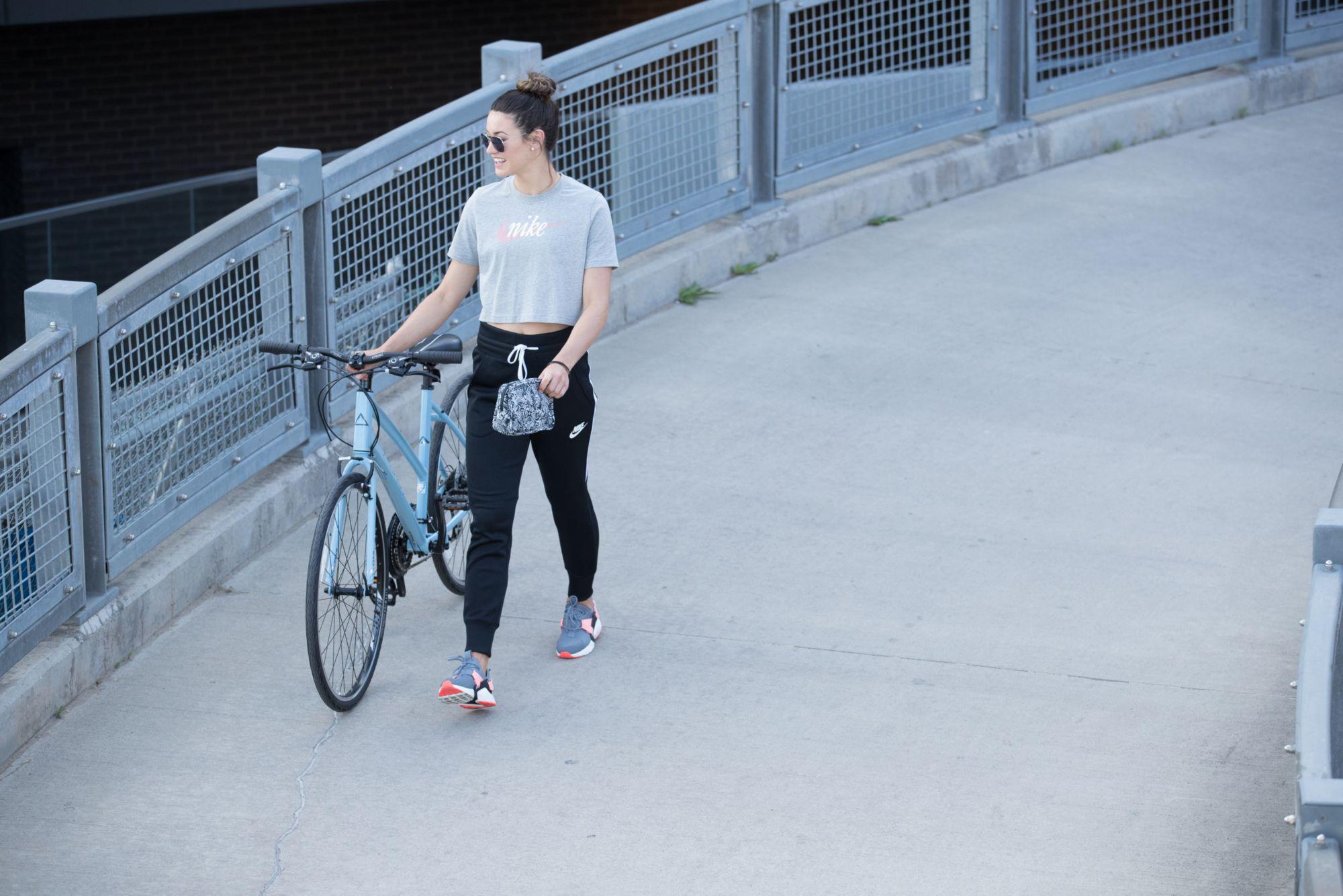 nike women's sportswear tracksuit joggers rust pink