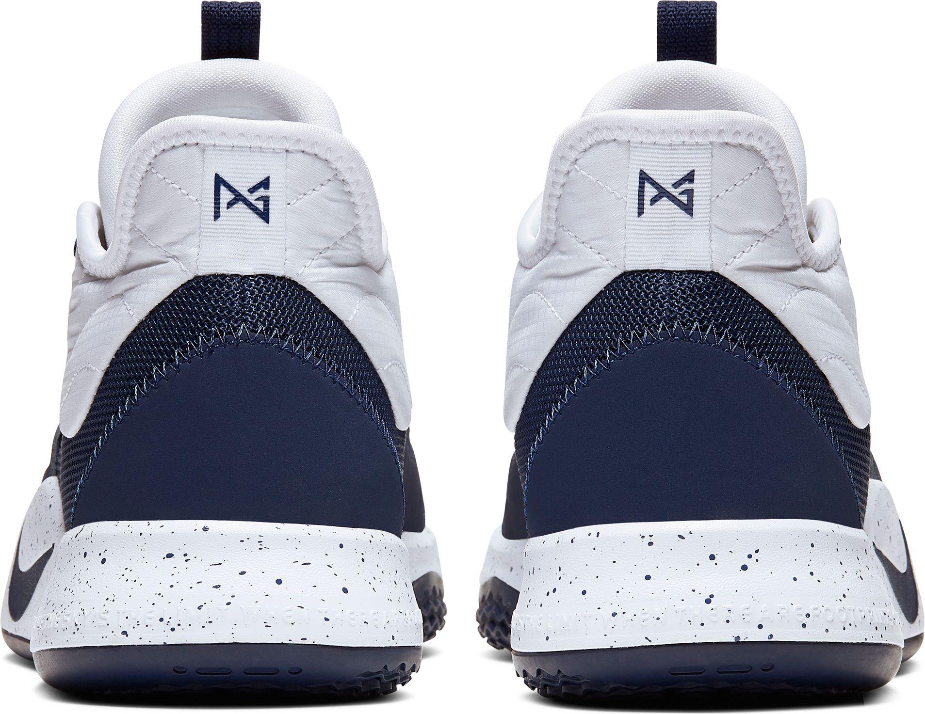 white and navy blue basketball shoes