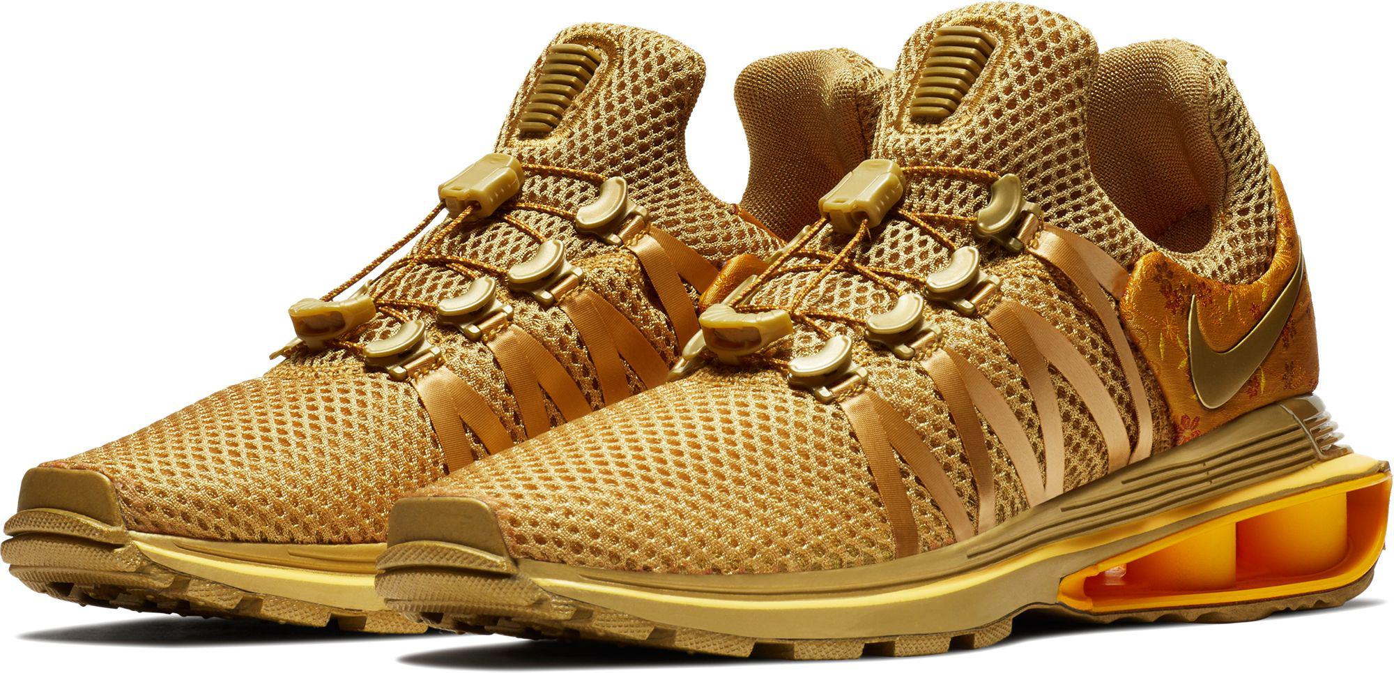 nike shox gravity gold