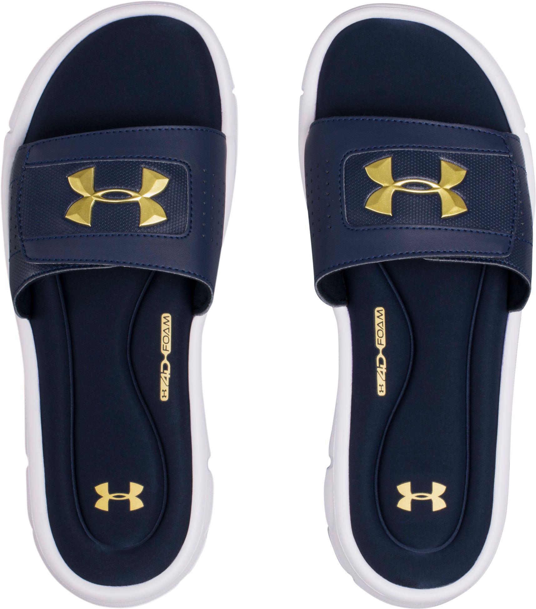 navy and gold under armour shoes