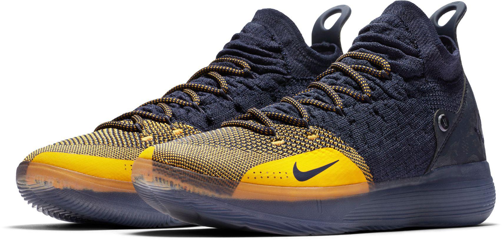 navy blue and gold basketball shoes