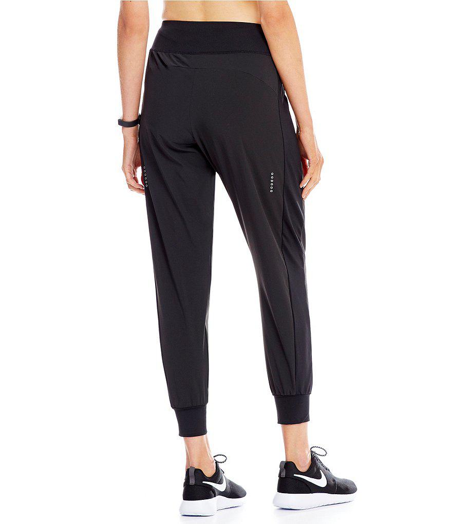 nike flex essential running pant