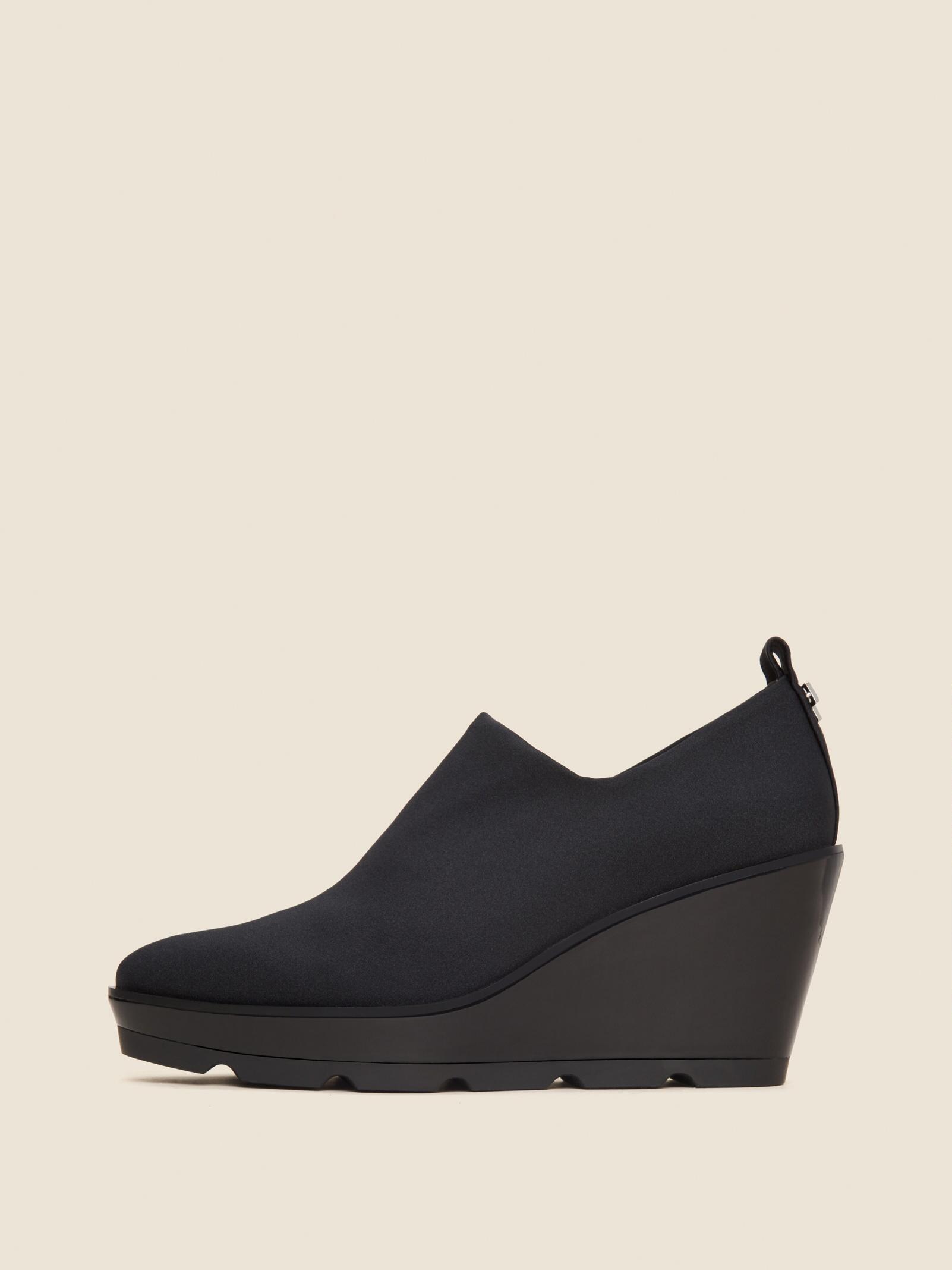 dkny slip on wedge sneaker