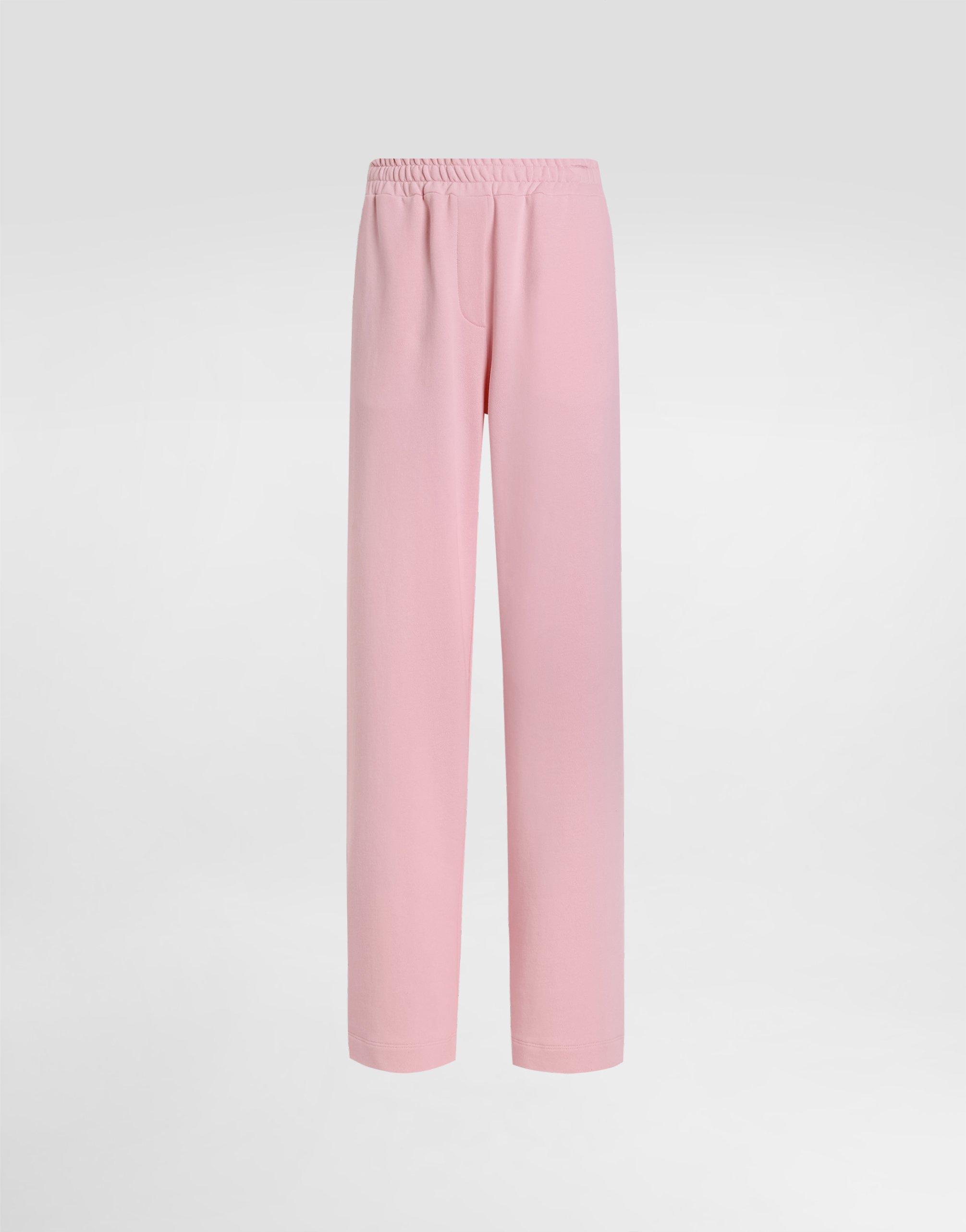パンツ DOLCE & GABBANA Logo joggers Pink Chenille jogging pants with jacquard DG logo in Pink for