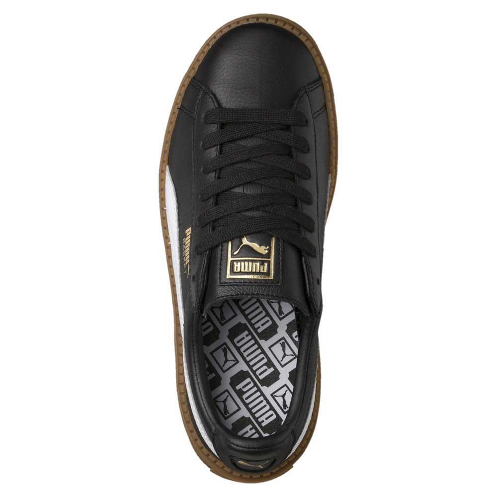 puma platform trace trainers in black with gum sole