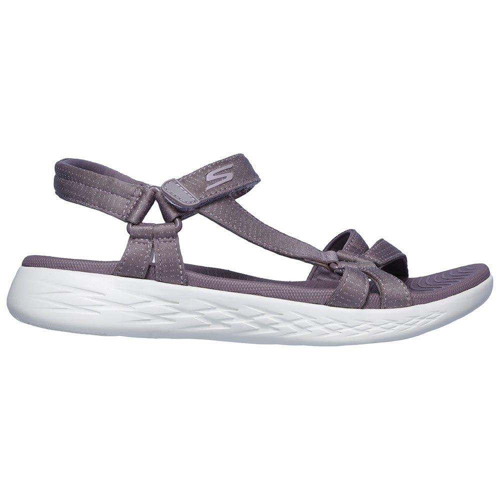 purple skechers sandals